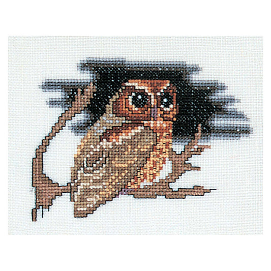 Cross-stitched owl on a branch with a white background