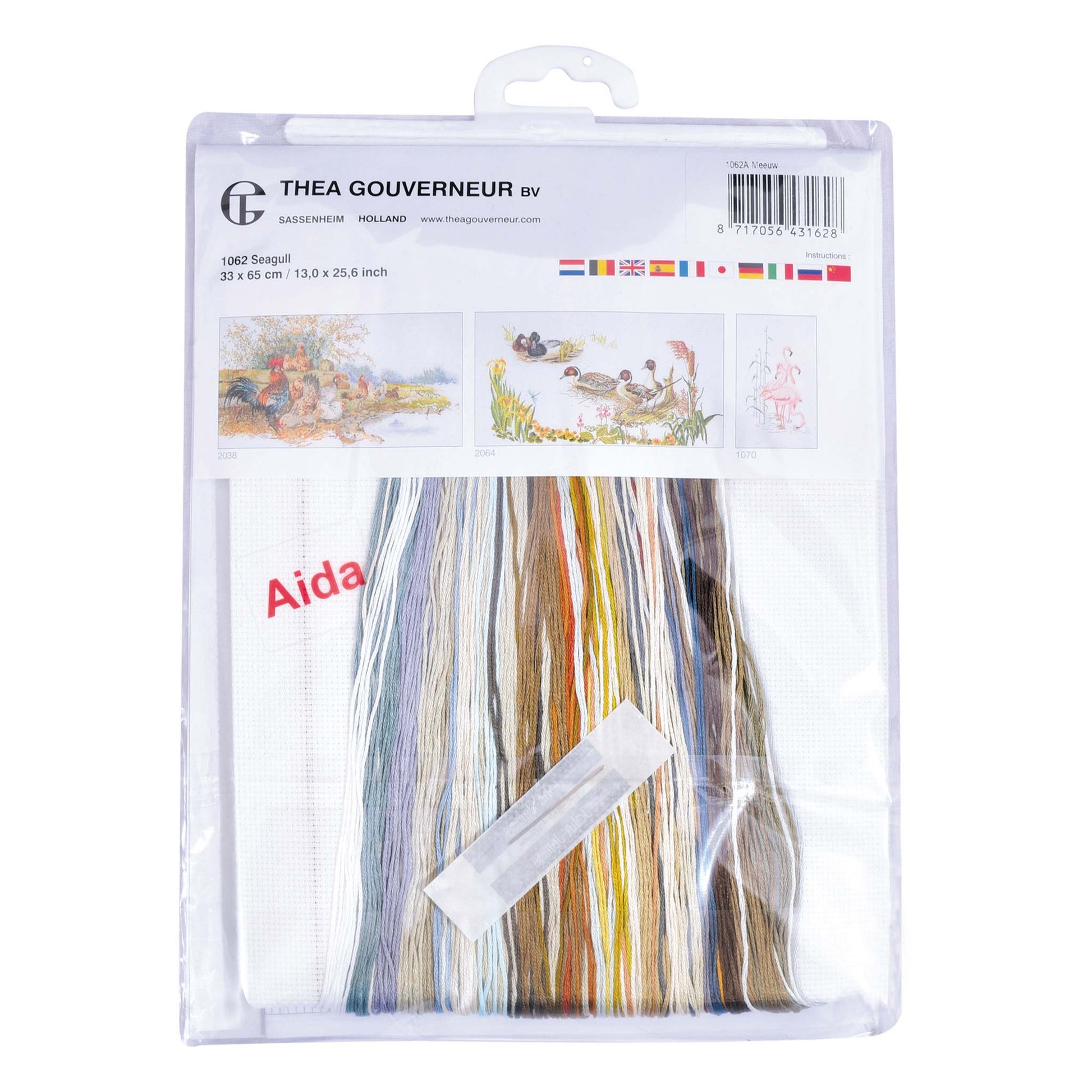 Packaged embroidery kit with threads and patterns on a white background