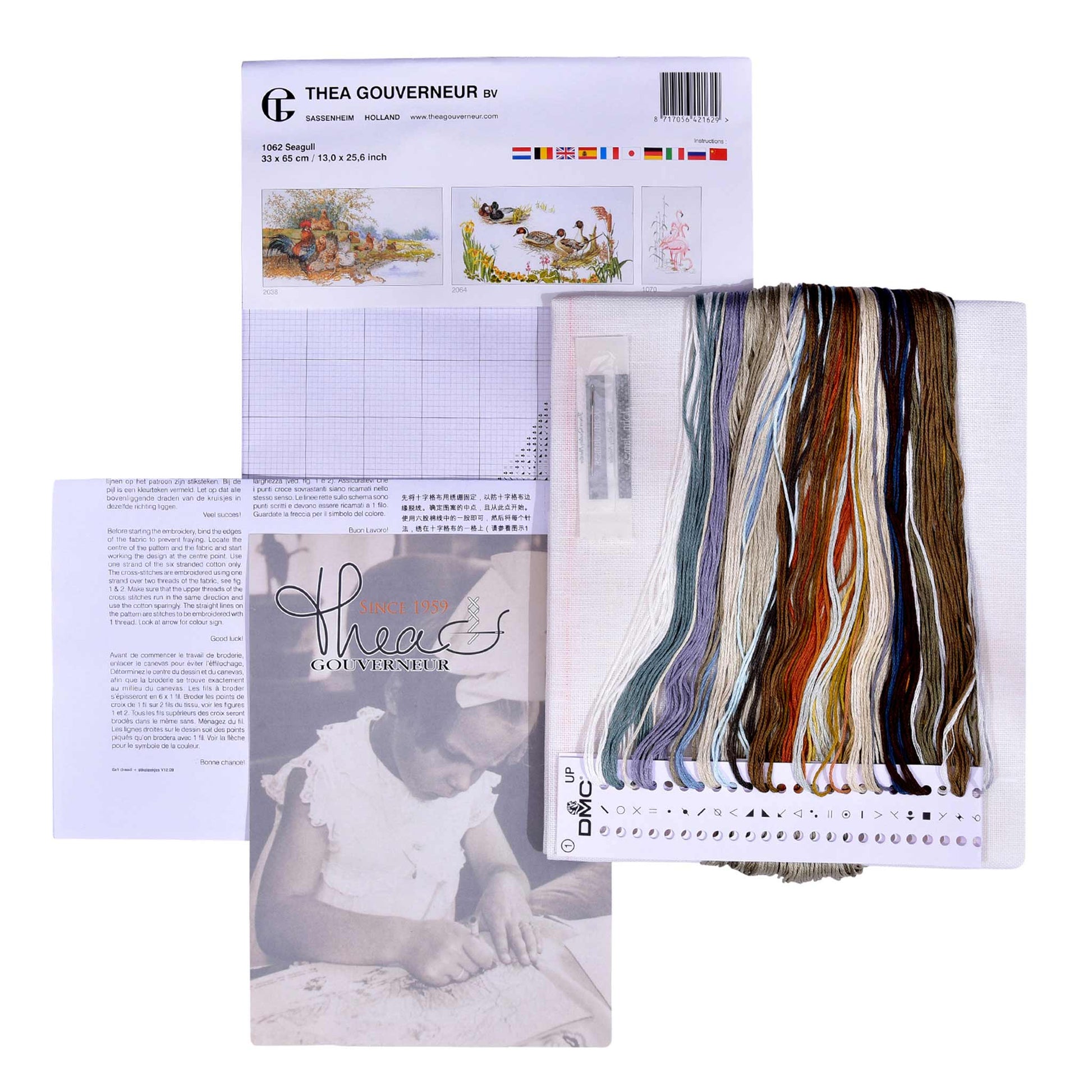 Embroidery kit with color chart and threads on a white background