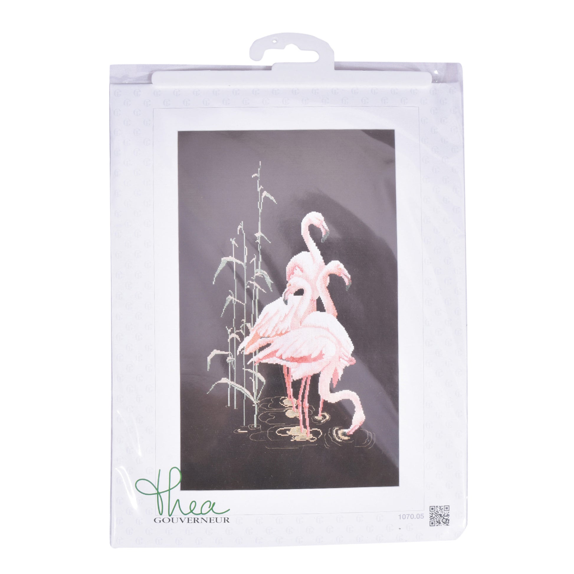 Packaged embroidery design with flamingo and reeds on a gray background, featuring the brand 'Thea Gouverneur'.