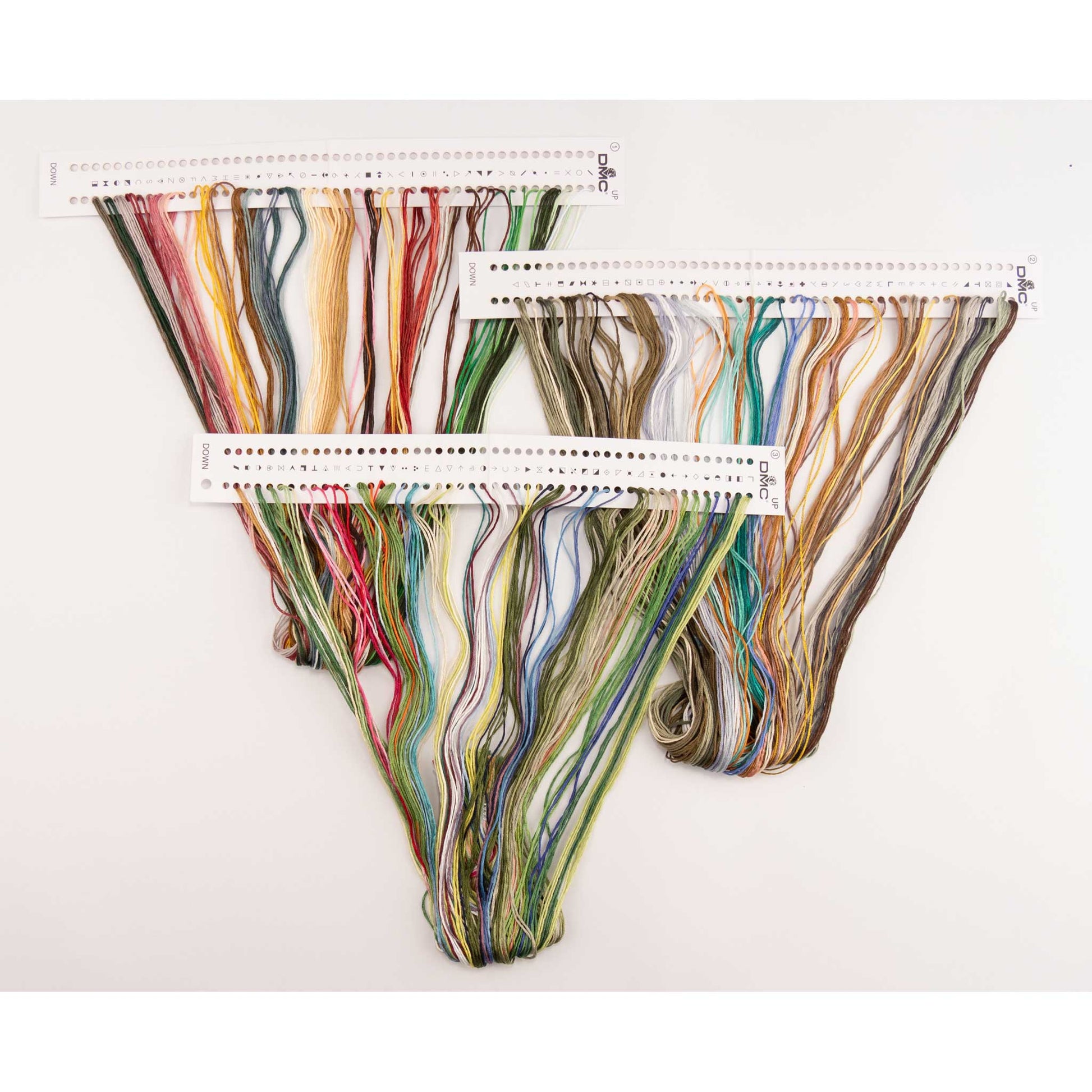 Colorful threads presorted on the floss organizers