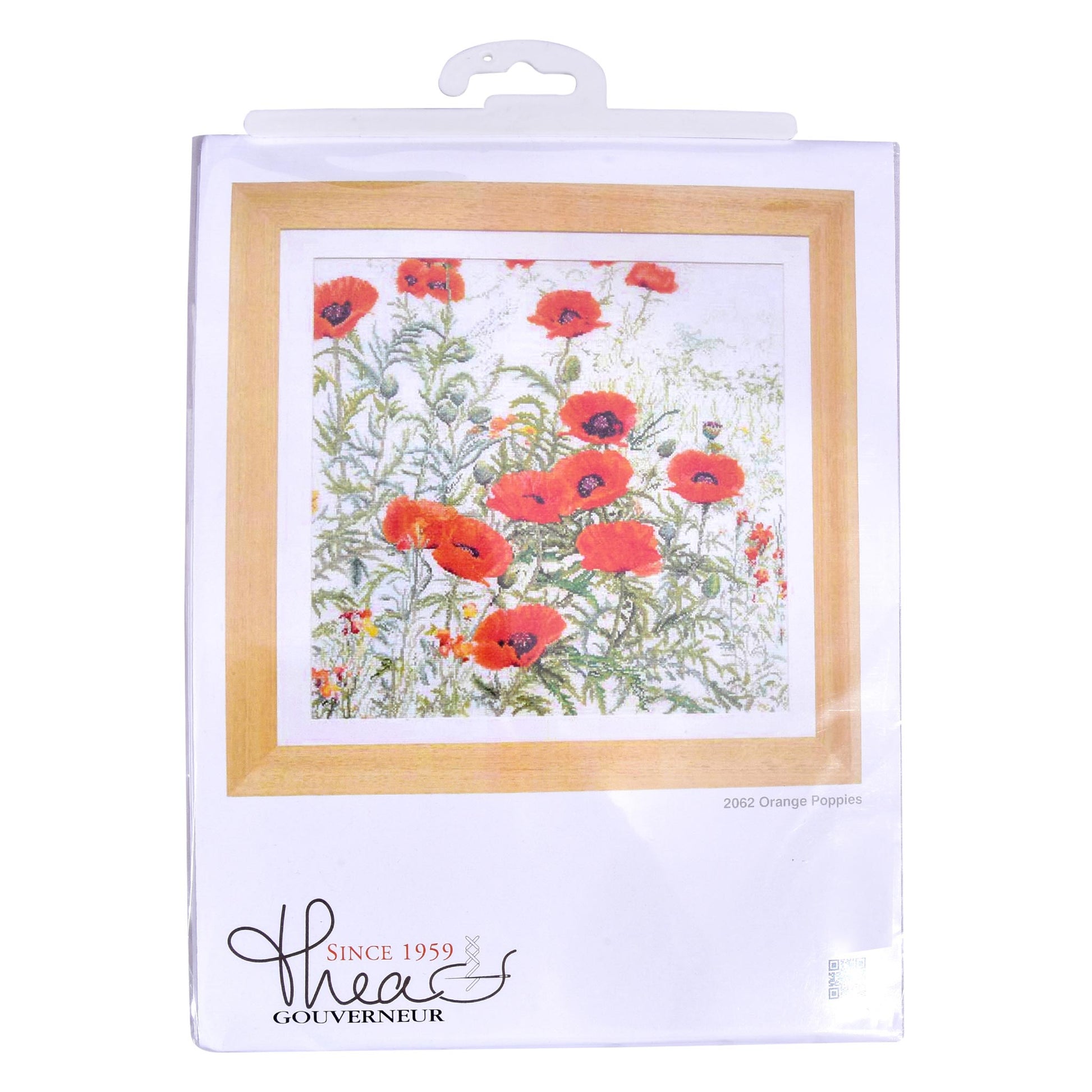 Packaged cross stitch kit with red poppies flowers on a meadow