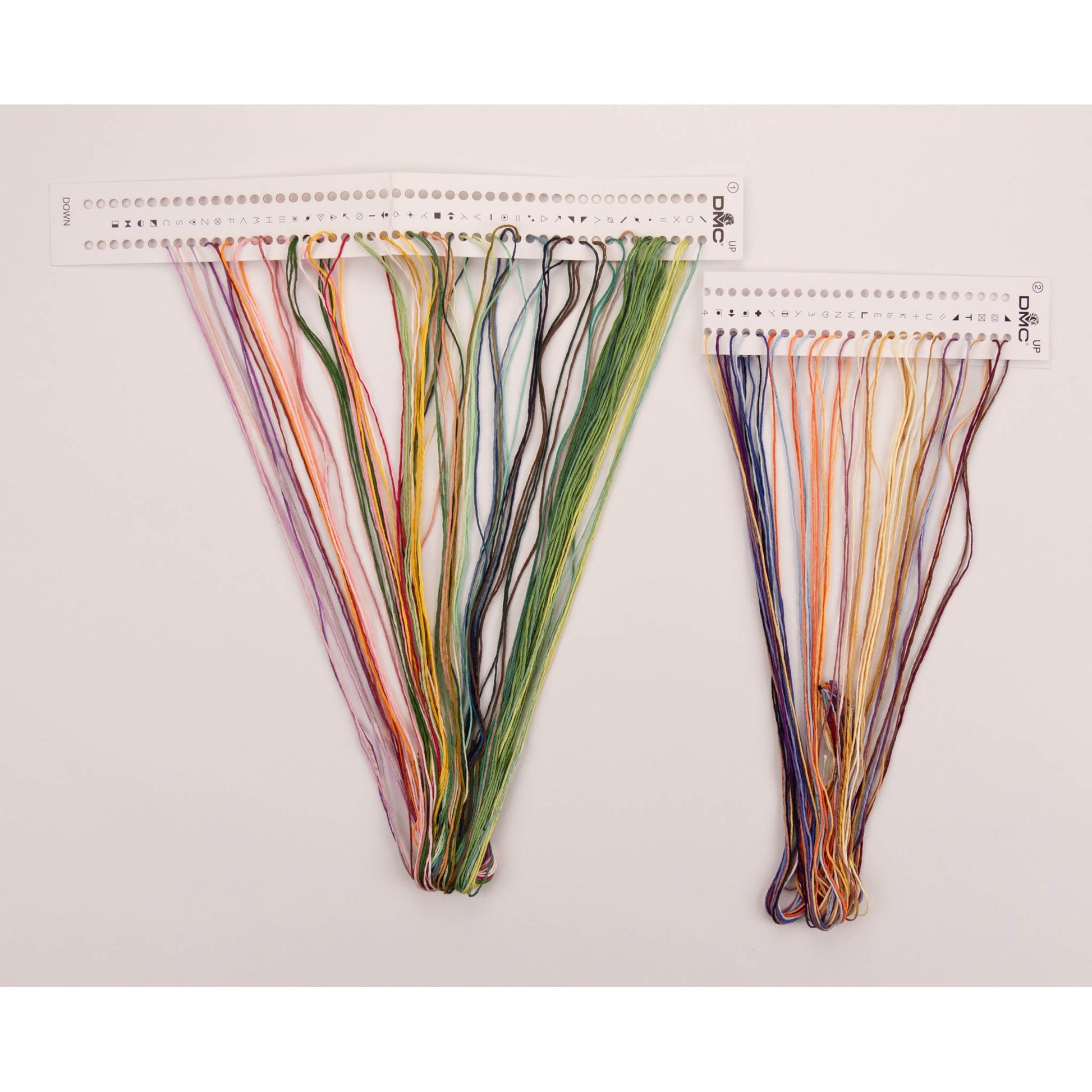 Set of colorful DMC threads presorted on the organizer floss