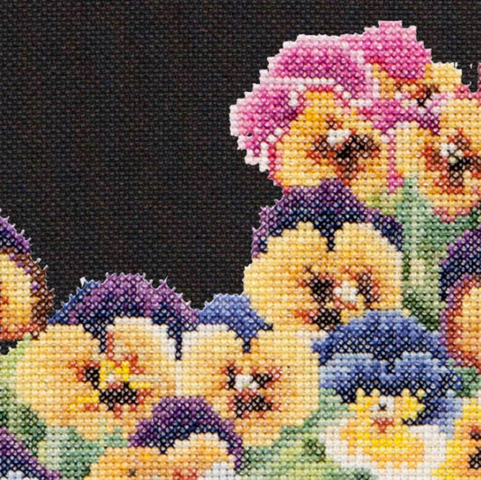 Cross stitch mockup of colorful pansies flowers
