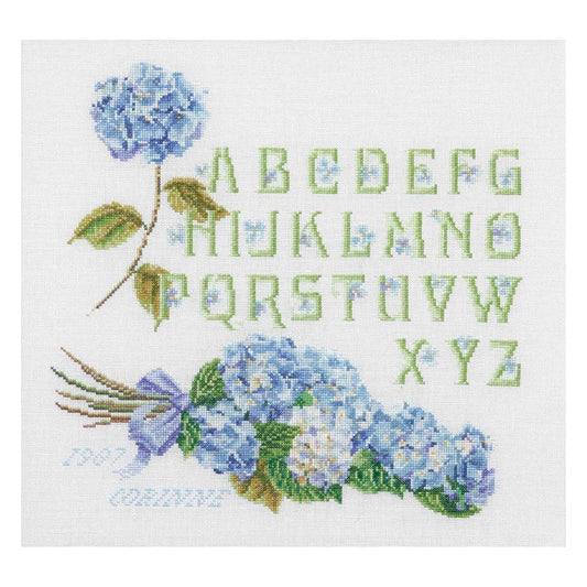 Cross-stitched pattern with blue hydrangeas and a floral alphabet on a white background