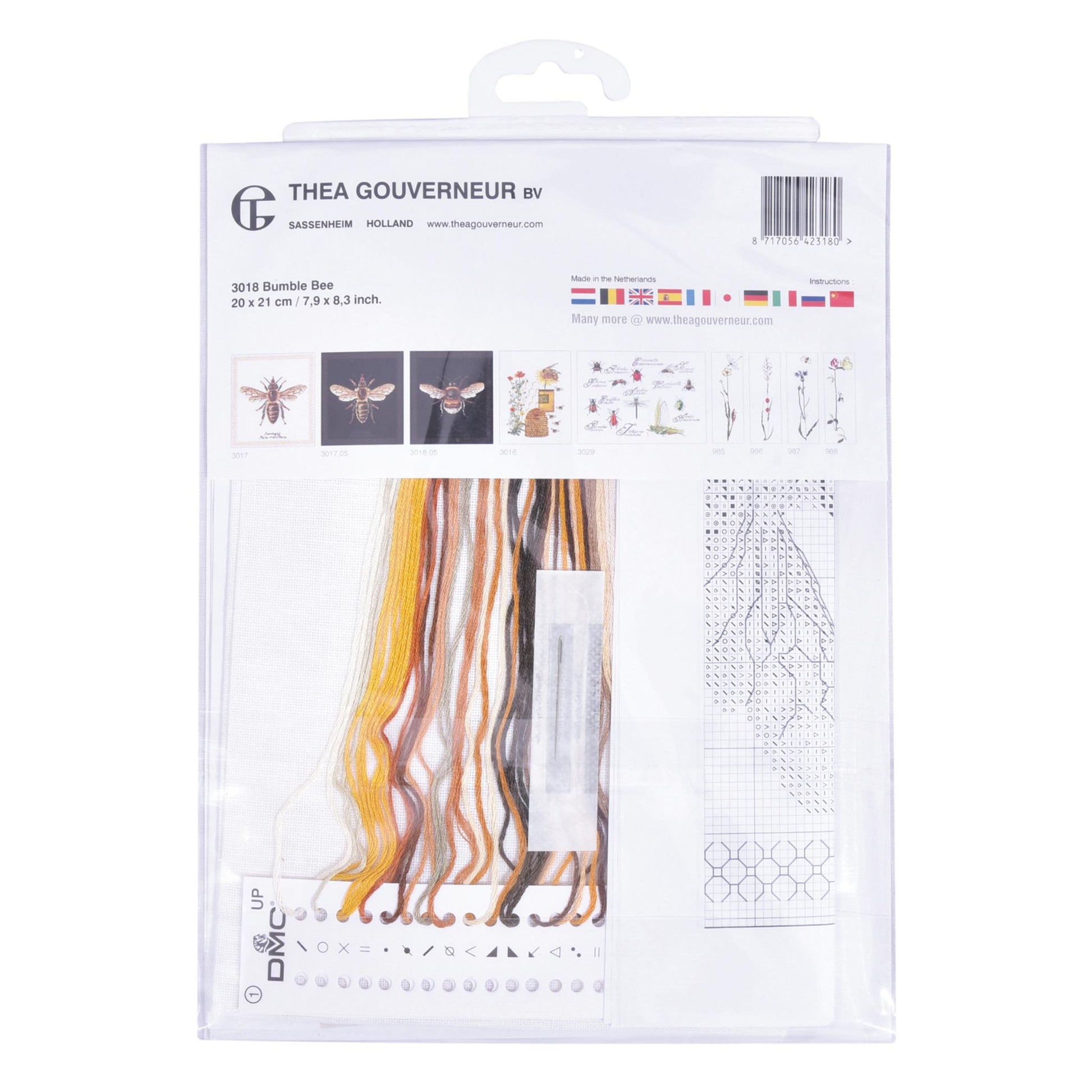 Embroidery kit with linen needlework fabric and packaging displaying dmc embroidery threads and kit content