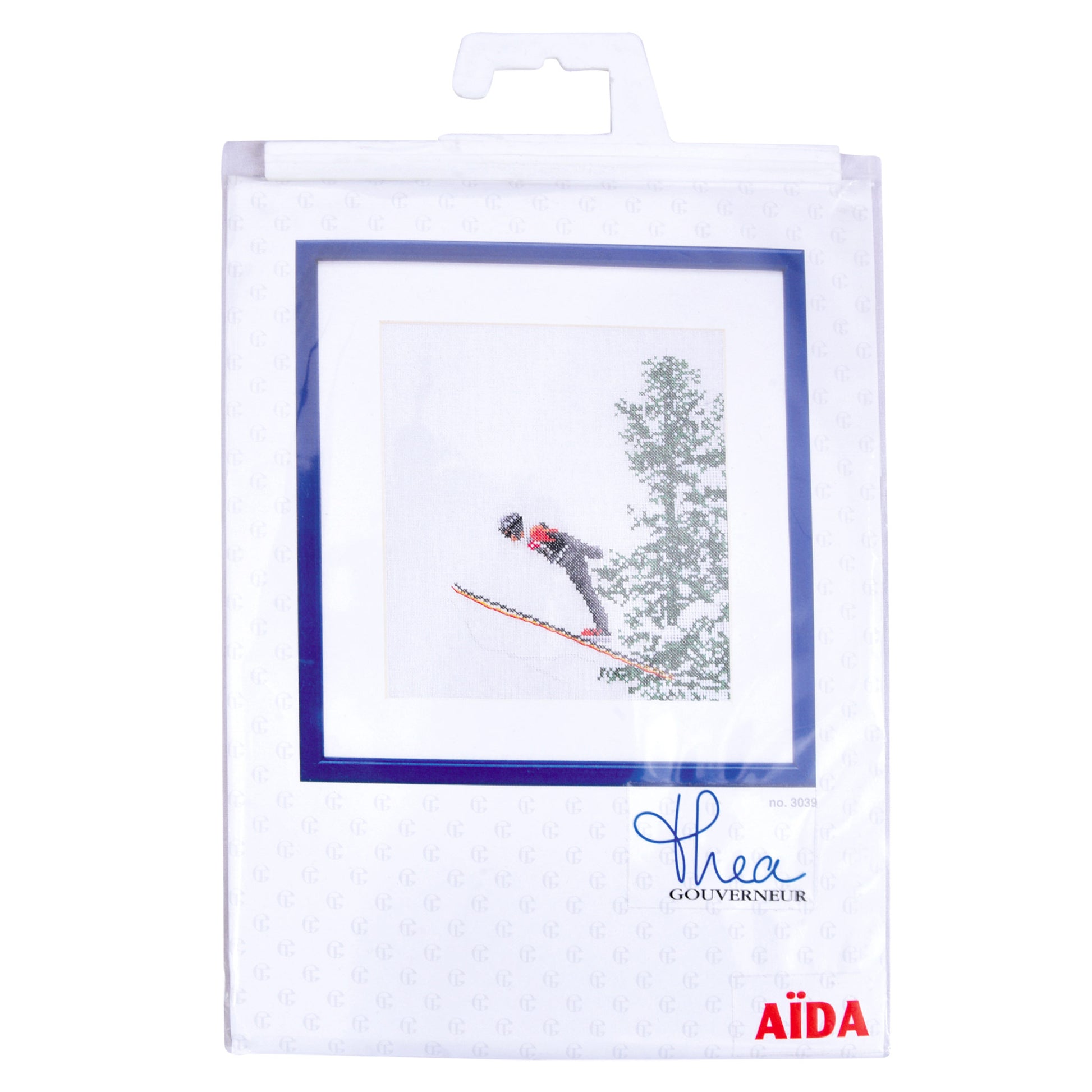 Packaged cross stitch of a skier in mid-air with trees, featuring the Thea Gouverneur brand.