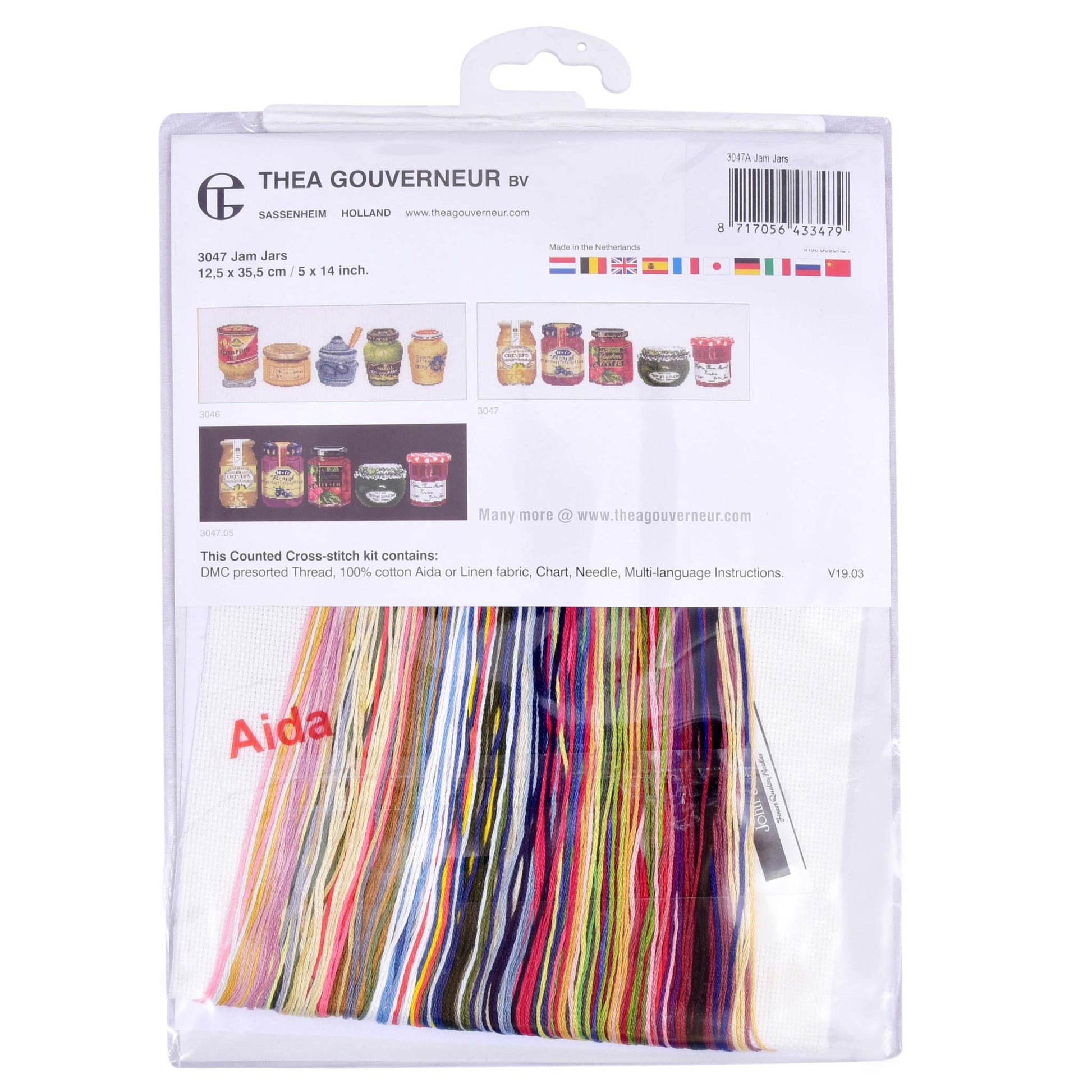 Cross-stitch kit packaging with colorful Aida fabric and Thea Gouverneur branding.