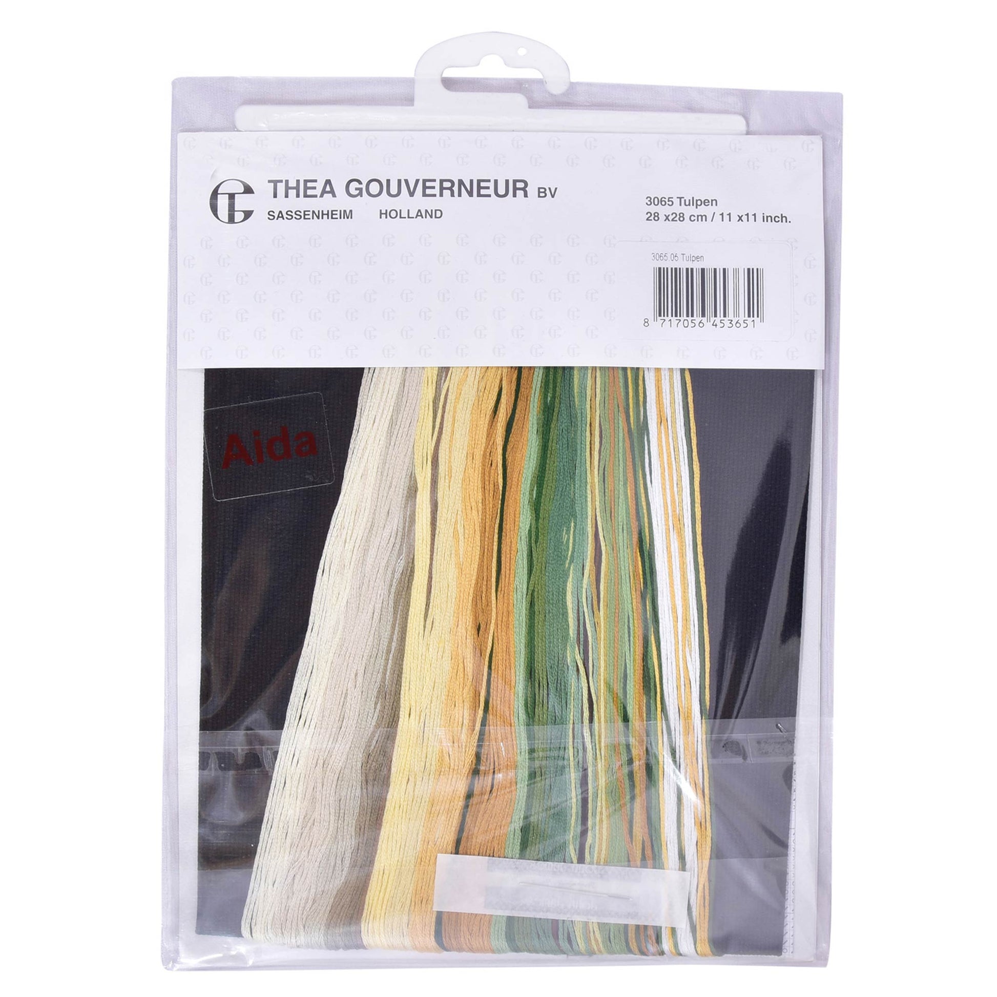 Packaging of cross stitch kit with colorful dmc embroidery threads and patterns on a white background