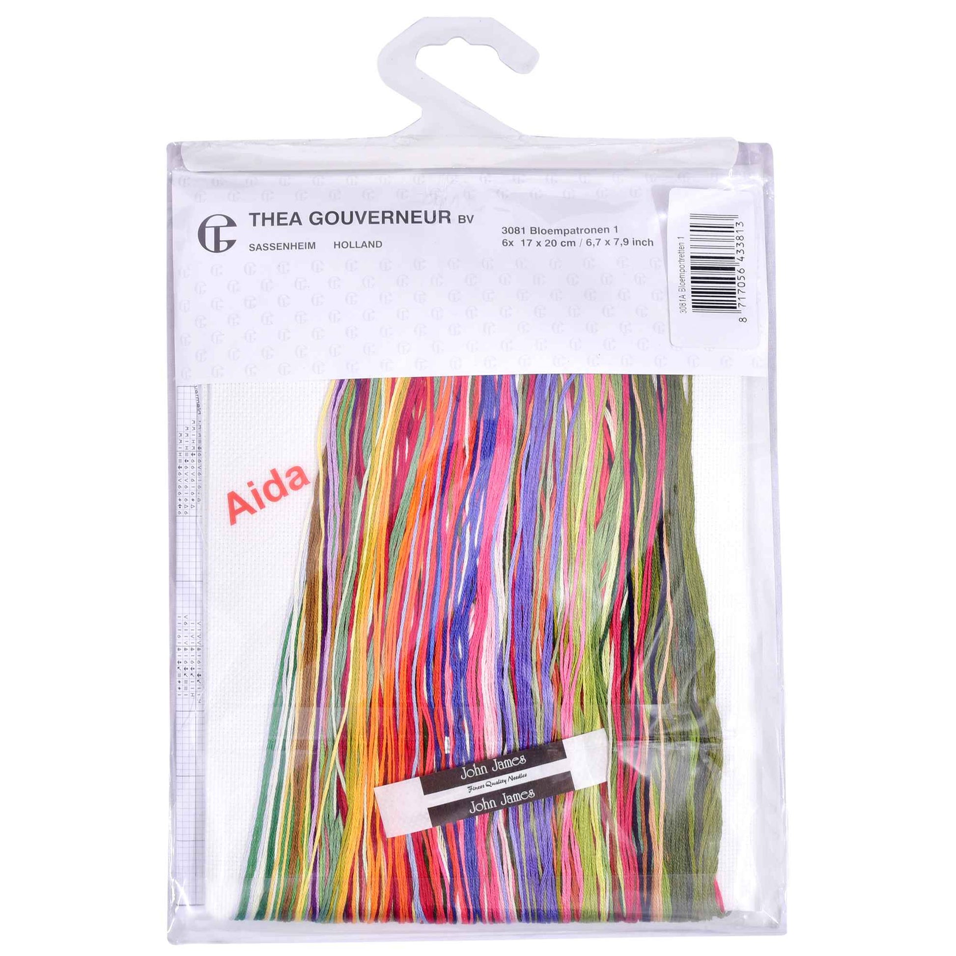 Packaged embroidery floss with colorful strands, embroidery needle and needlework fabrics