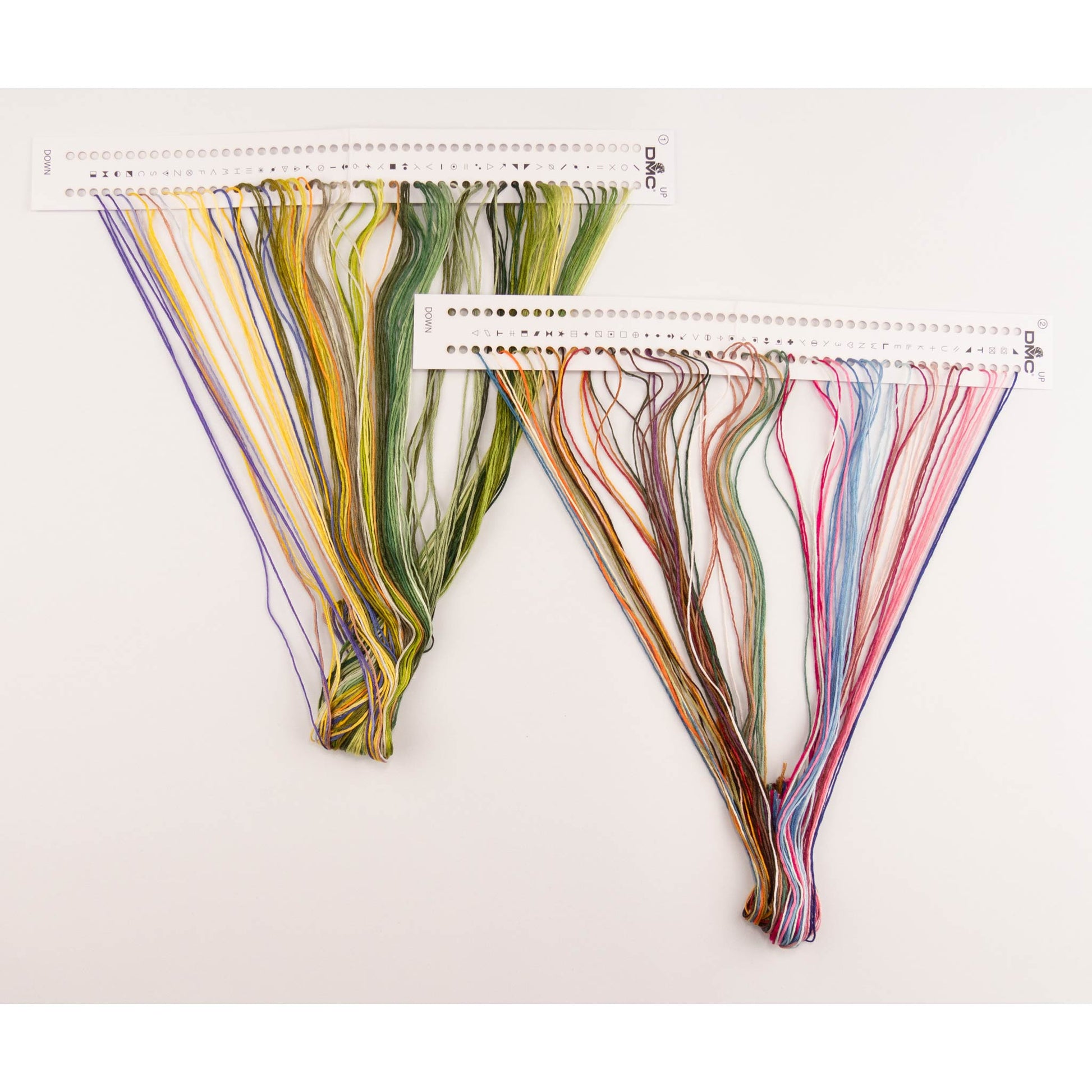 Set of colorful DMC threads presorted on organizer floss