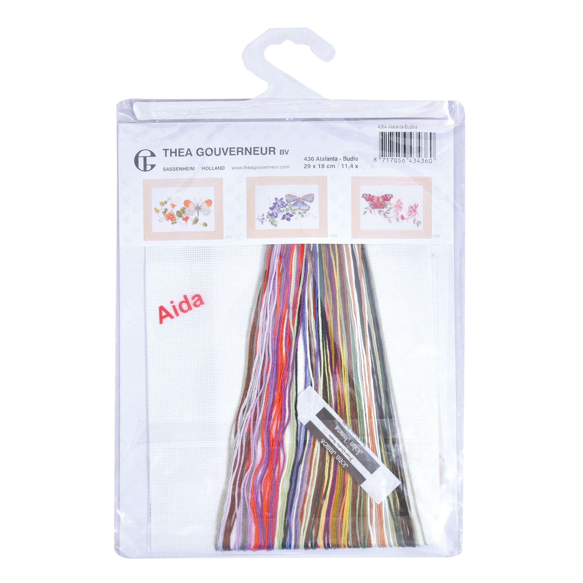 Packaging of embroidery kit with colorful dmc embroidery threads and patterns on a white background