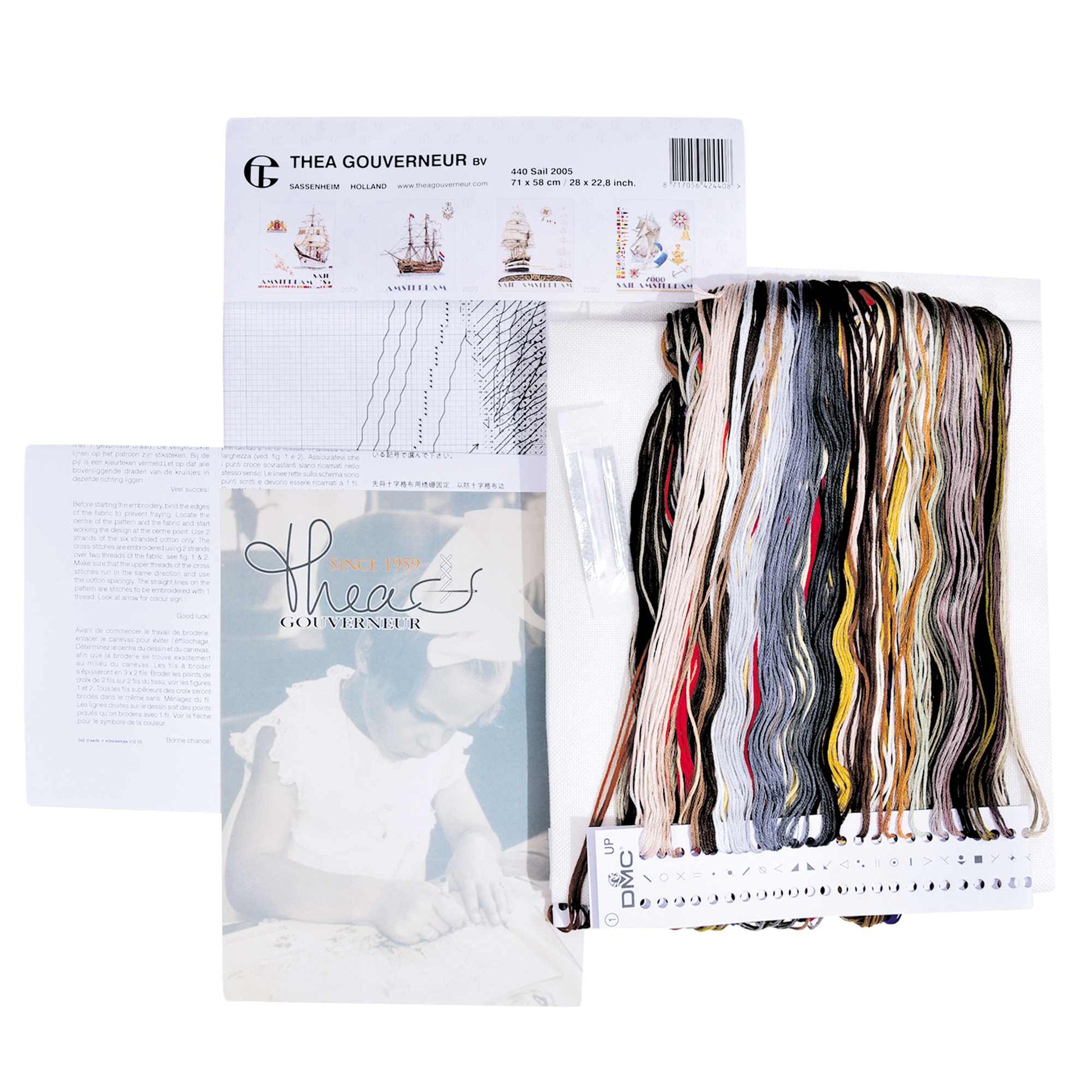 Embroidery kit packaging with cross-stitch threads and pattern chart 