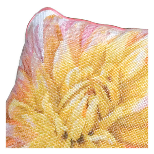 Close-up of a floral-patterned fabric with yellow and pink flowers.