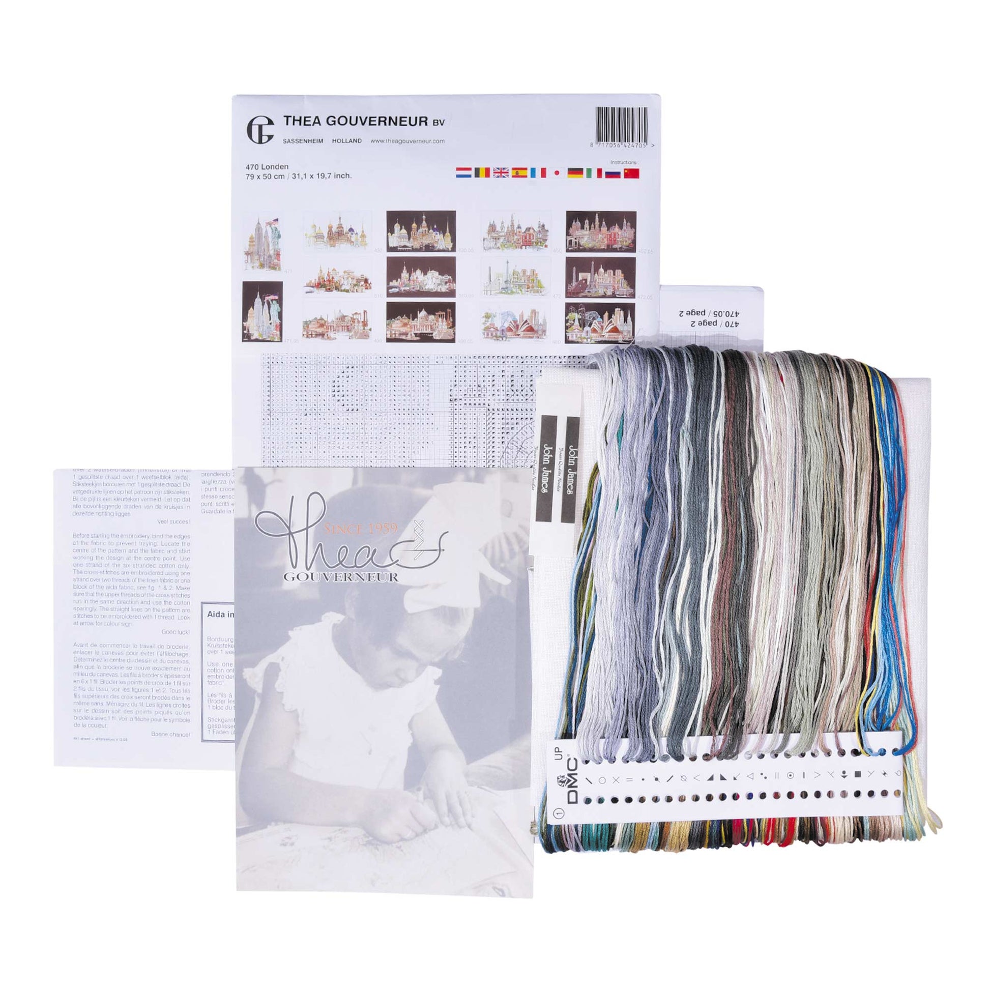 Embroidery kit with pattern and chart, needlework fabric, and threads on the floss organizer.