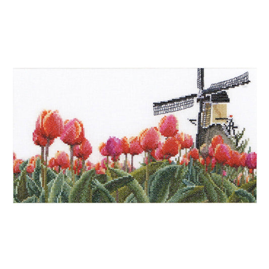 Cross-stitched design of tulips and a windmill on a white background