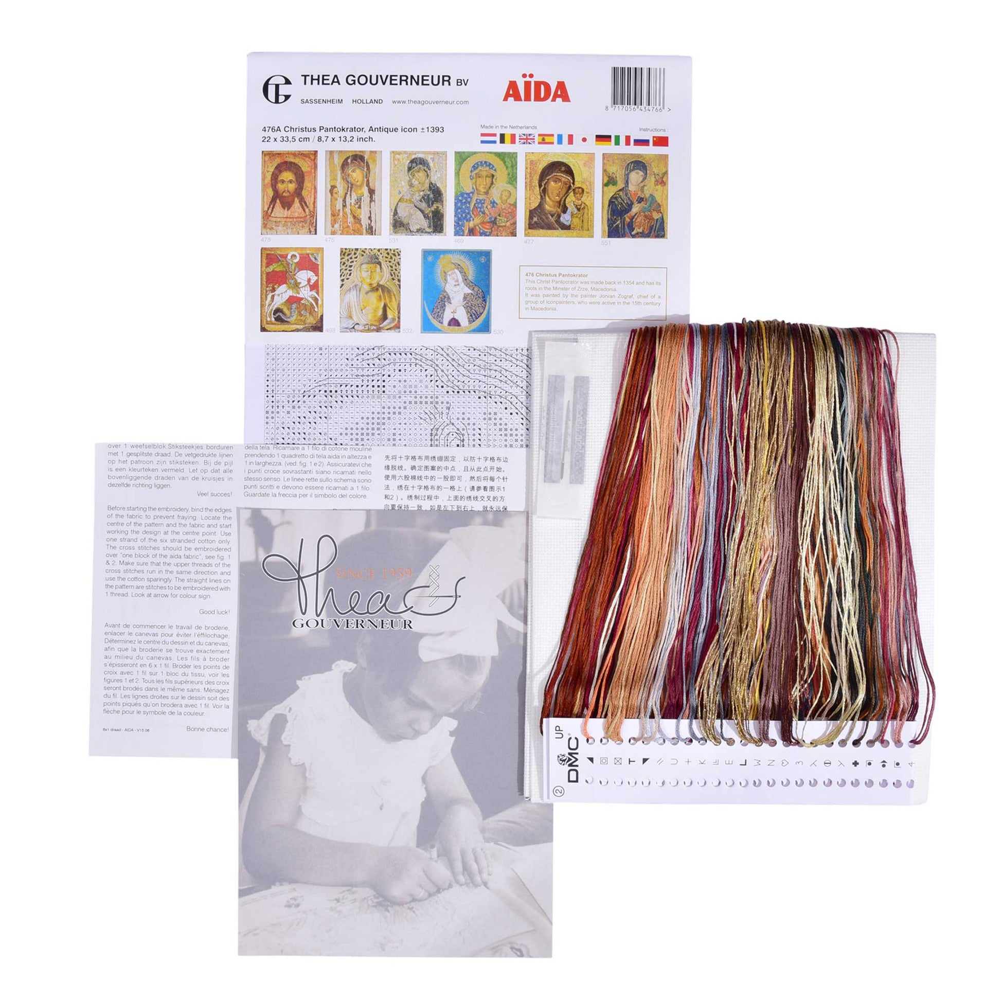 Embroidery kit with pattern and chart, needlework fabric, and threads on the floss organizer.