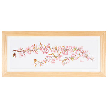 Cross stitch kit a cherry blossom branch on a white background
