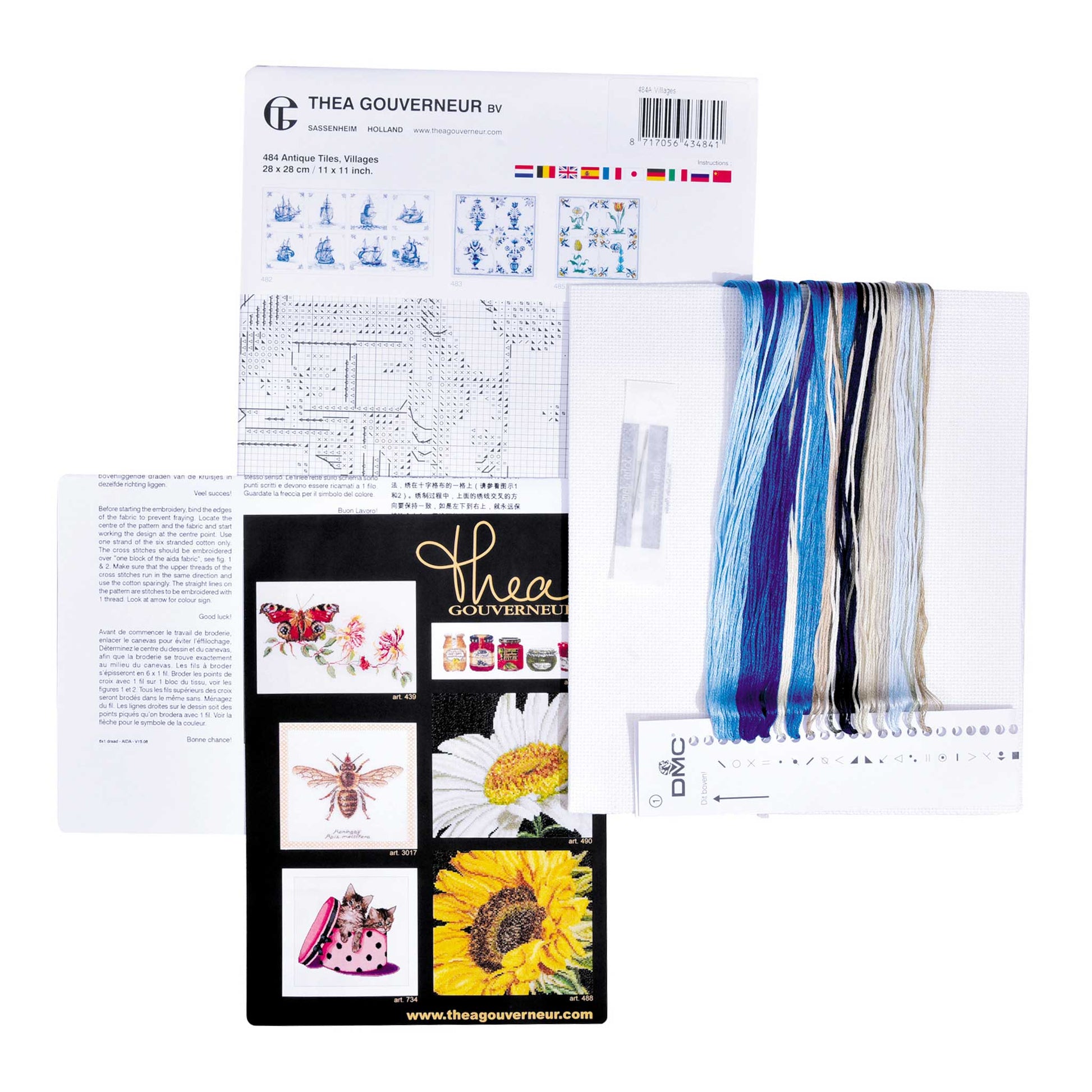 Embroidery kit with pattern and chart, needlework fabric, and threads on the floss organizer.