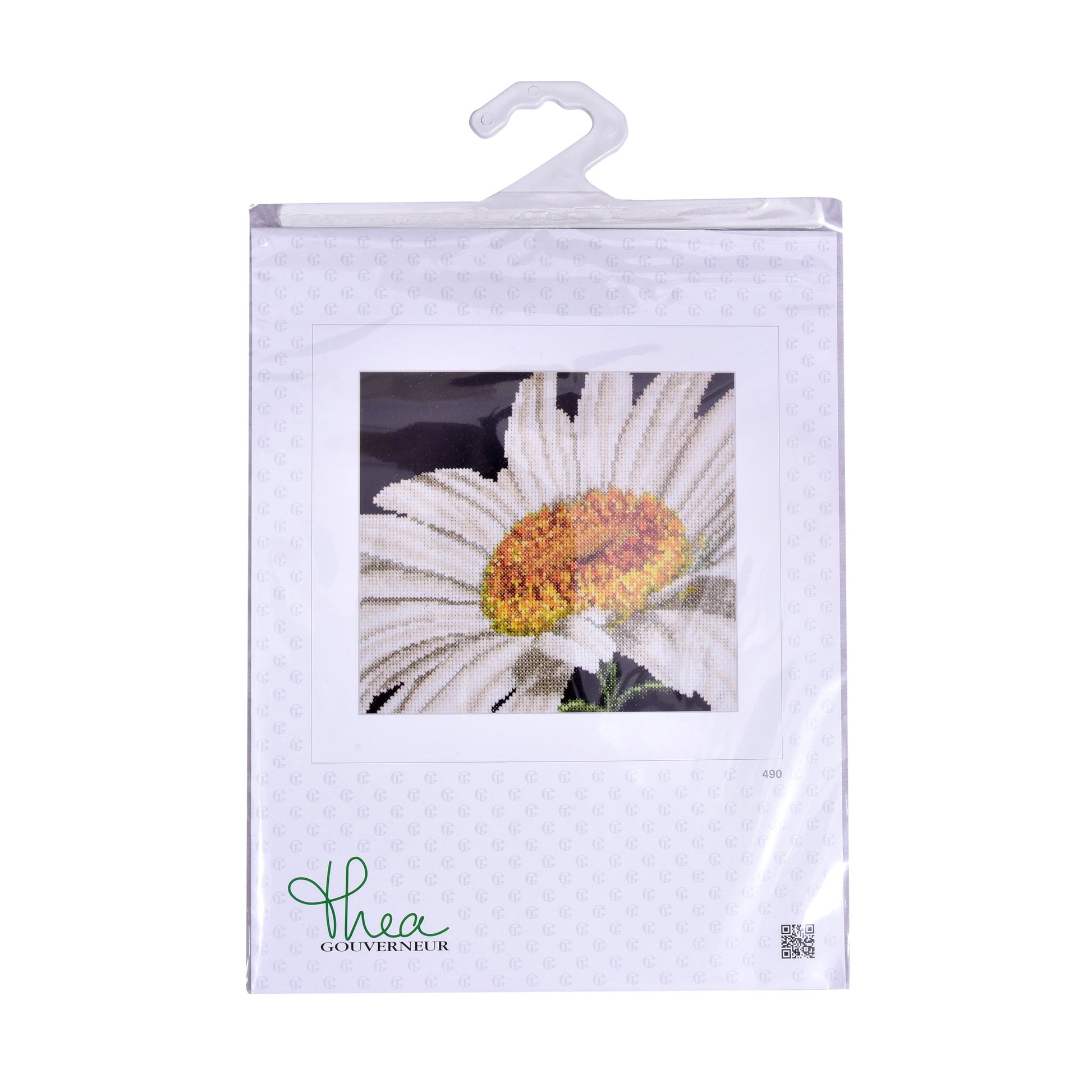 Packaged cross stitch kit with a daisy flower image and 'Thea Gouverneur' branding on a white background