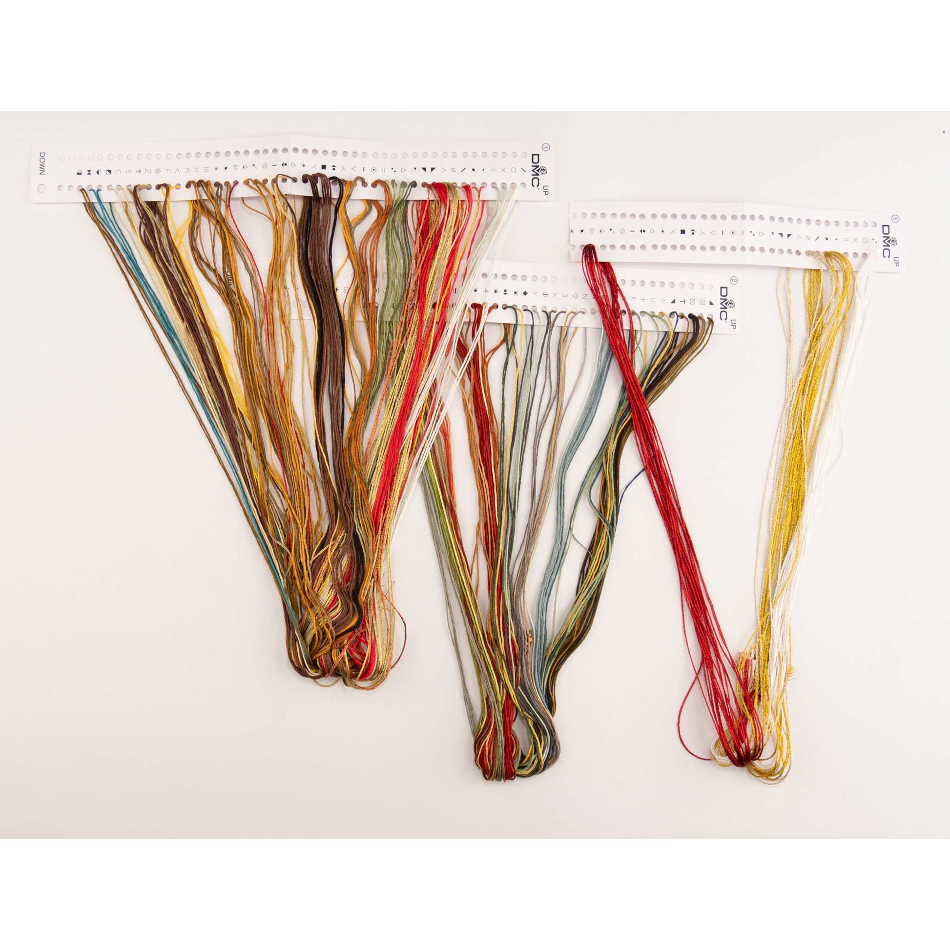 Set of colorful dmc embroidery threads presorted on the floss organizer