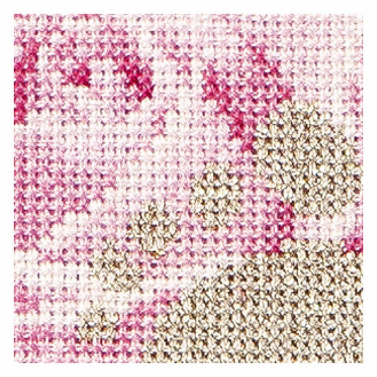 close up cross stitch birth sample with pink and beige colors