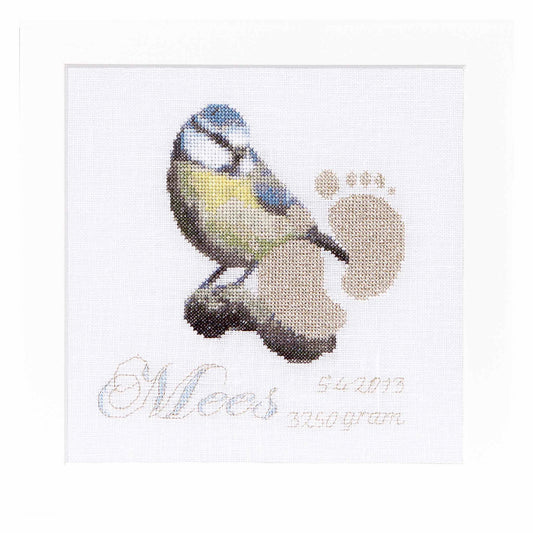 Cross-stitched design of a bird for newborn sample