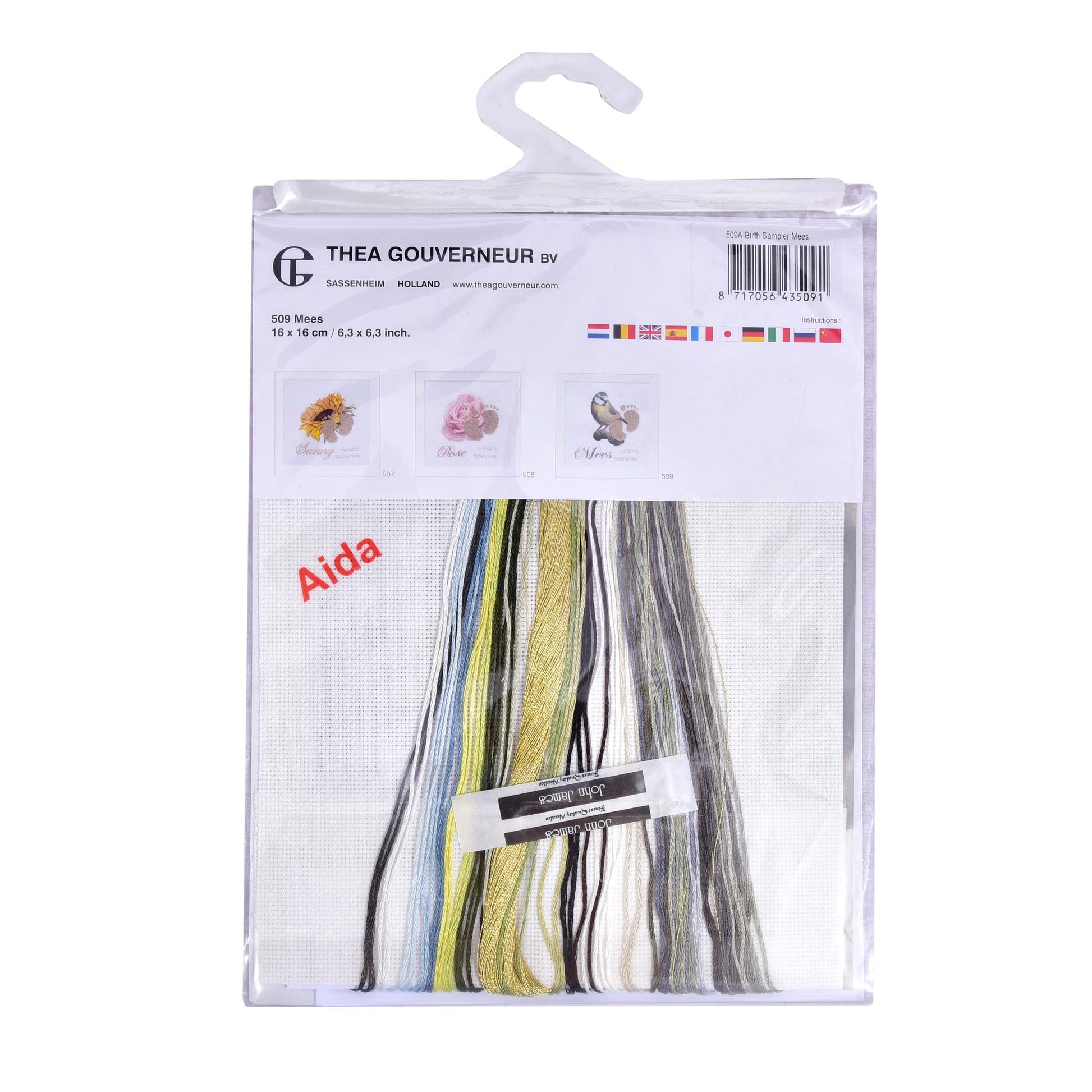 Packaged embroidery kit with threads and patterns on a white background