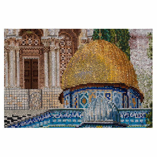 close up cross stitched design of a dome and architectural elements on a white background