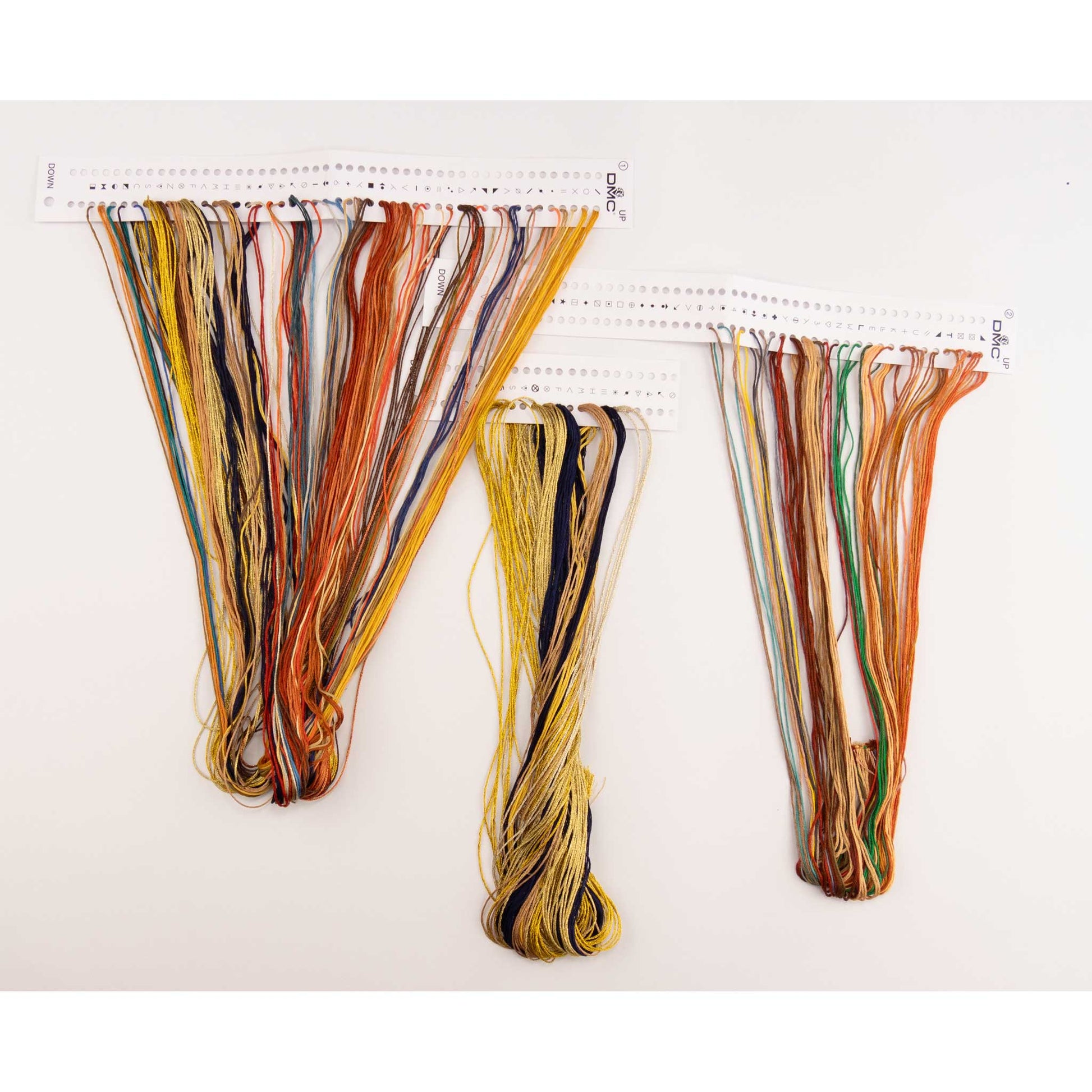 Set of colorful dmc embroidery threads presorted on the floss organizer