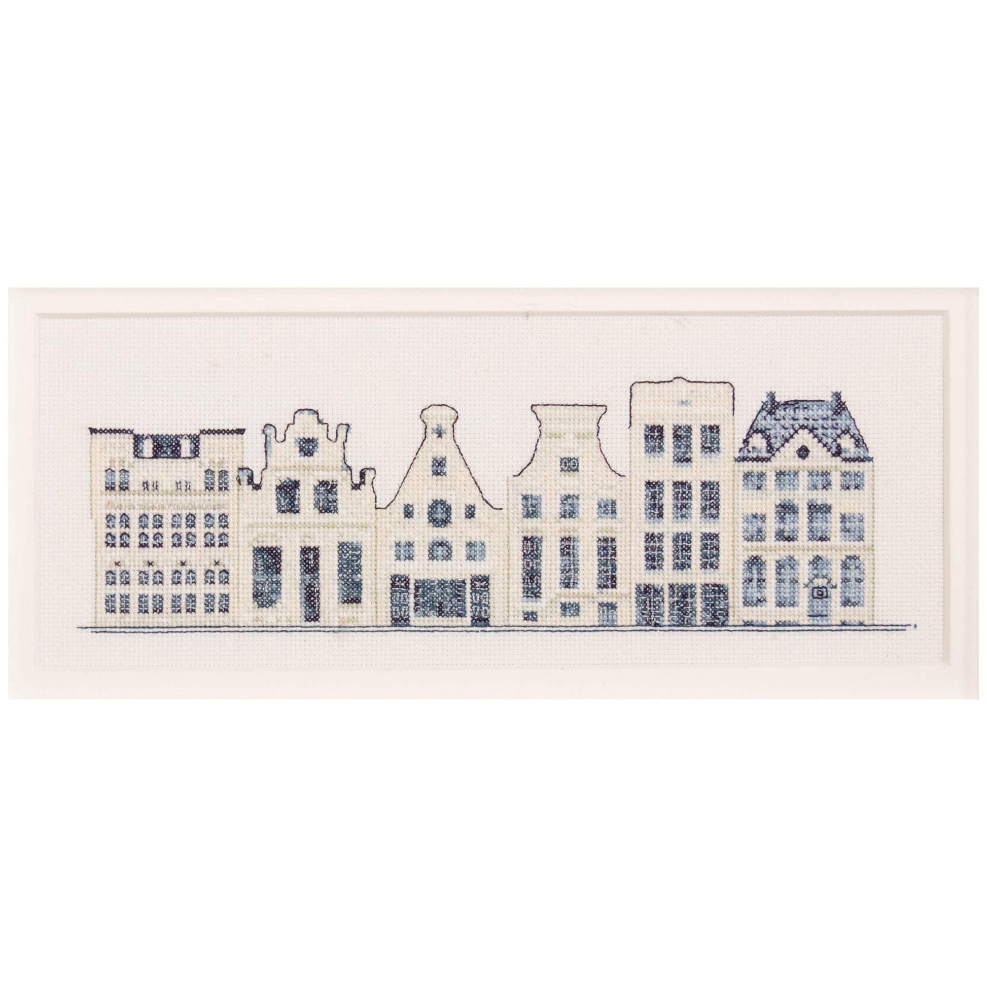 Cross stitch pattern of Dutch stylized buildings on a white background