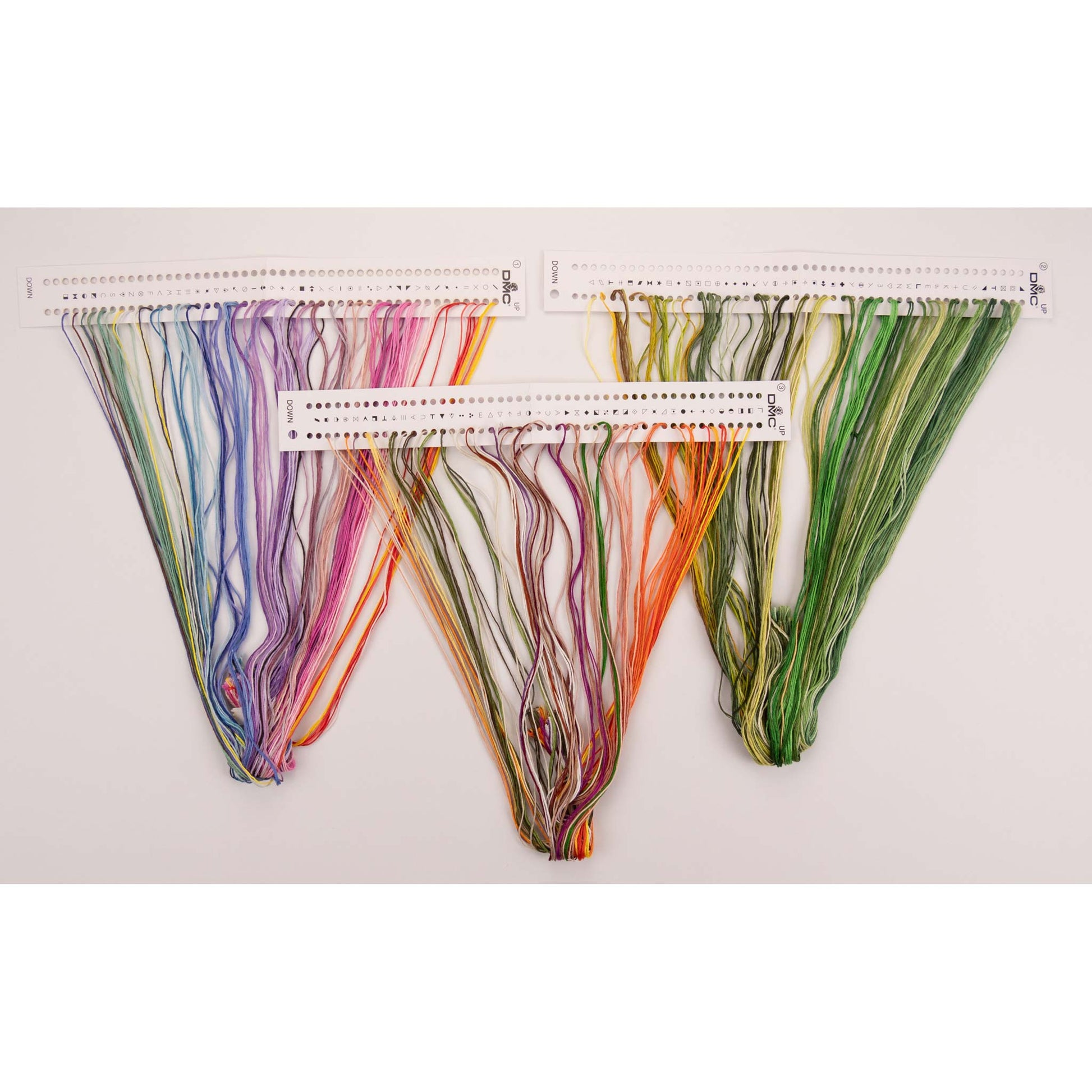 Set of colorful dmc embroidery threads presorted on the floss organizer
