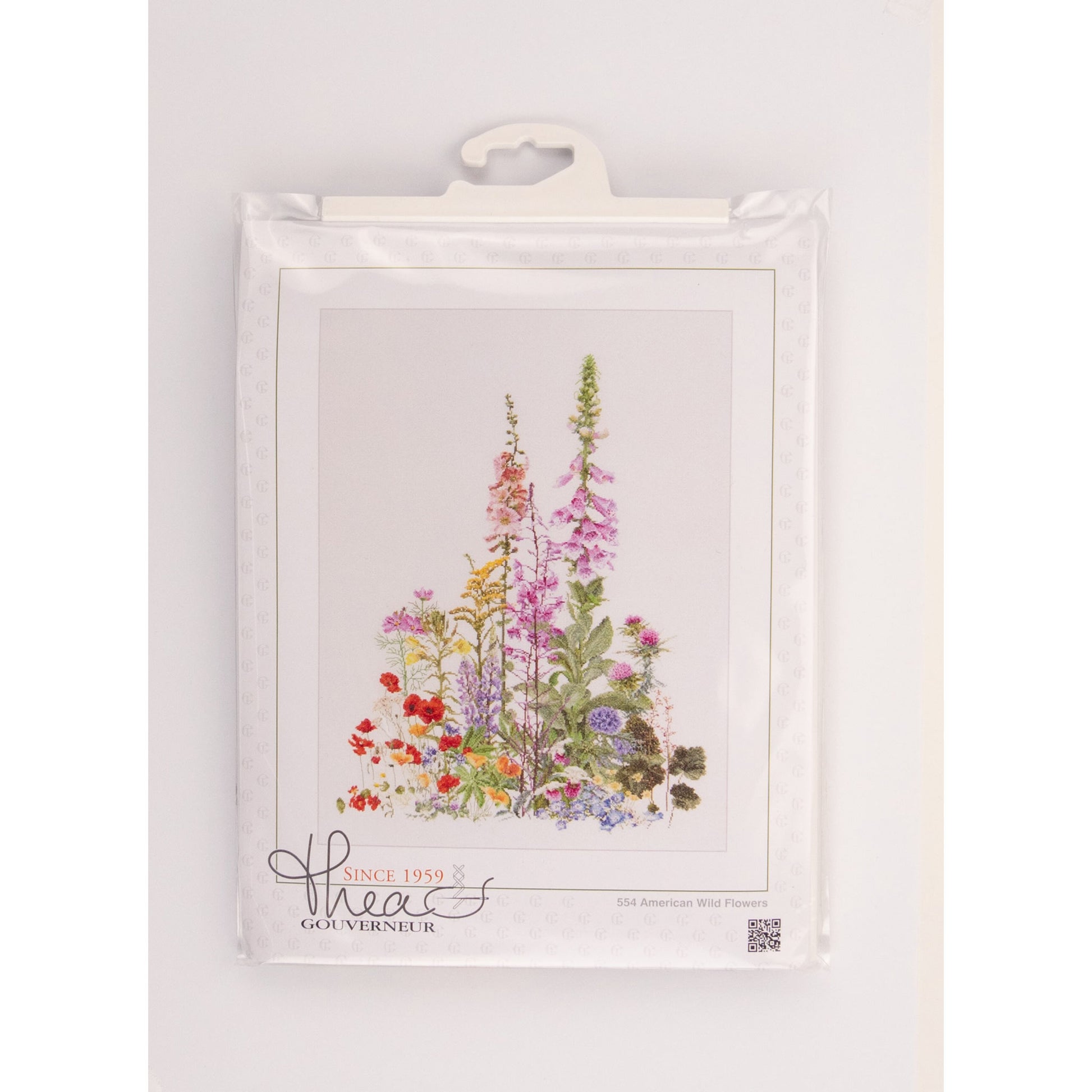 Packaged cross stitch kit of wild flowers , featuring the brand 'Thea Gouverneur'.
