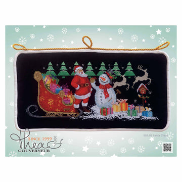 Decorative pillow with Santa Claus and snowman design on a light blue background