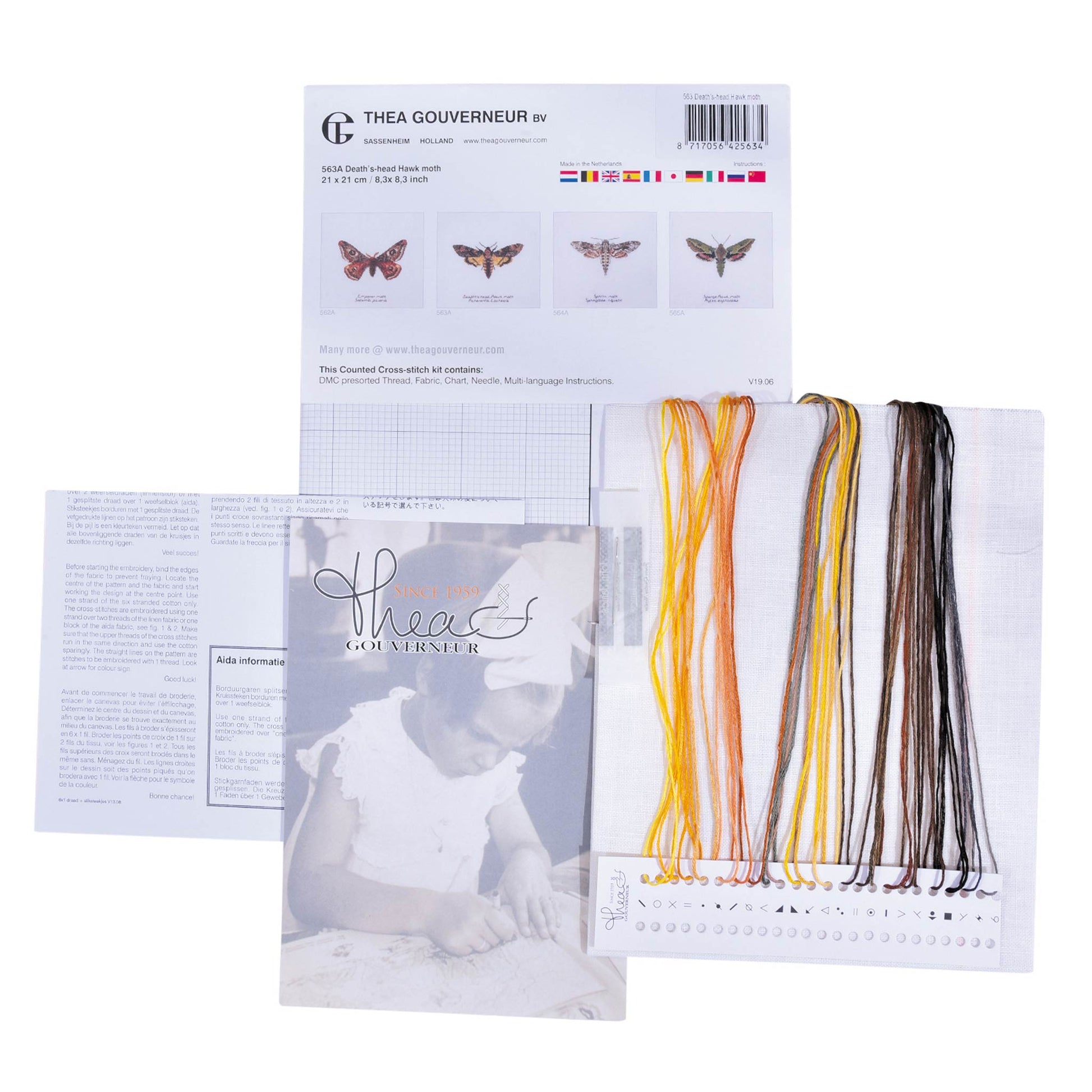 Cross stitch kit content: of colorful embroidery threads with packaging and branding on a white background