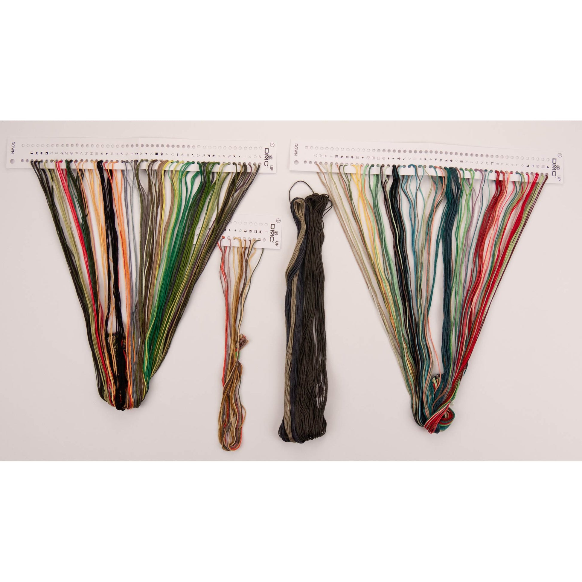 Set of colorful DMC threads presorted on organizer floss