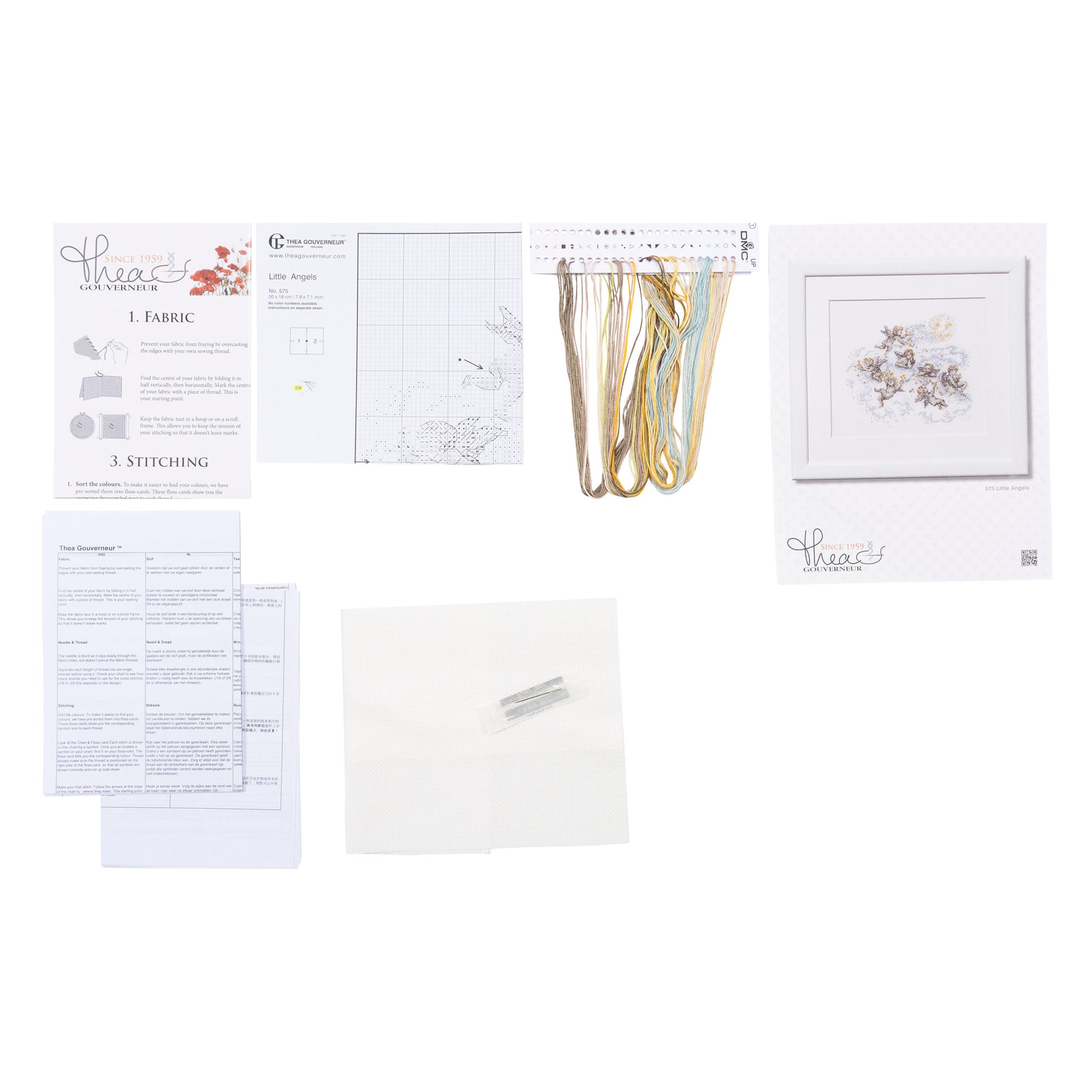 Embroidery kit with pattern and chart, needlework fabric, and threads on a white background