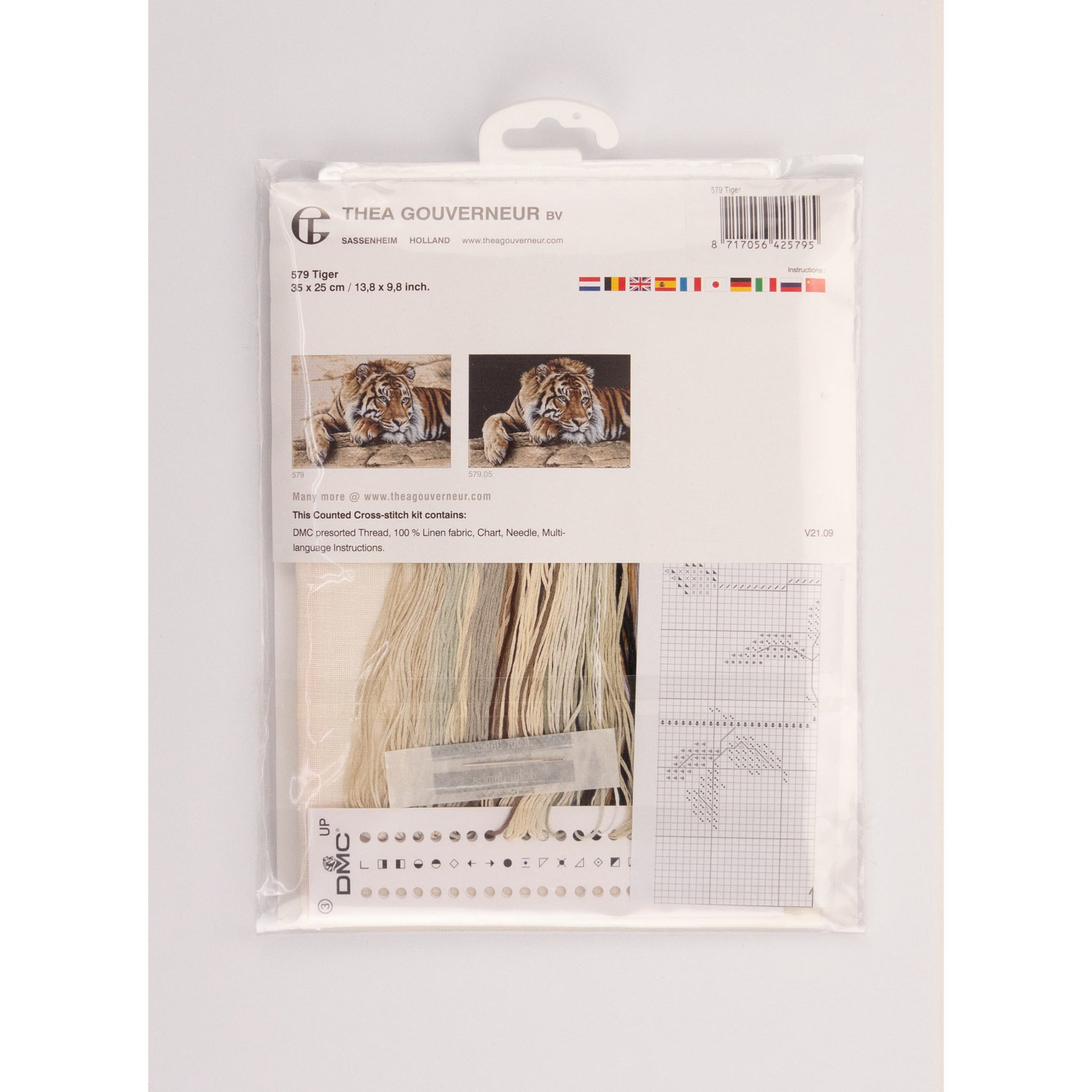 Embroidery kit with Aida needlework fabric and packaging displaying dmc embroidery threads and kit content