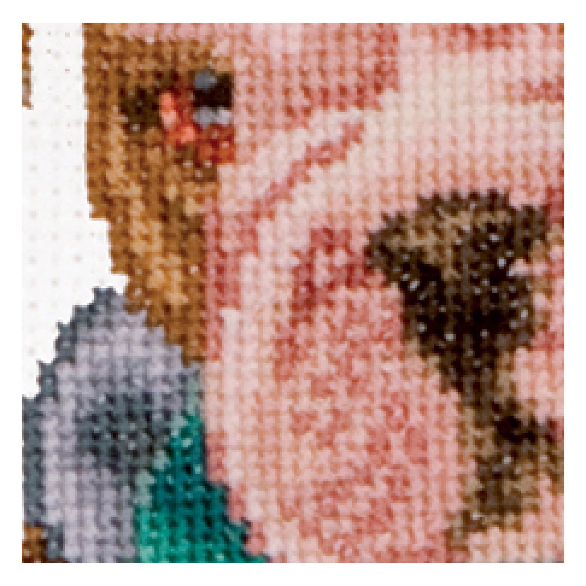 Close-up of a cross-stitched portrait with visible thread patterns