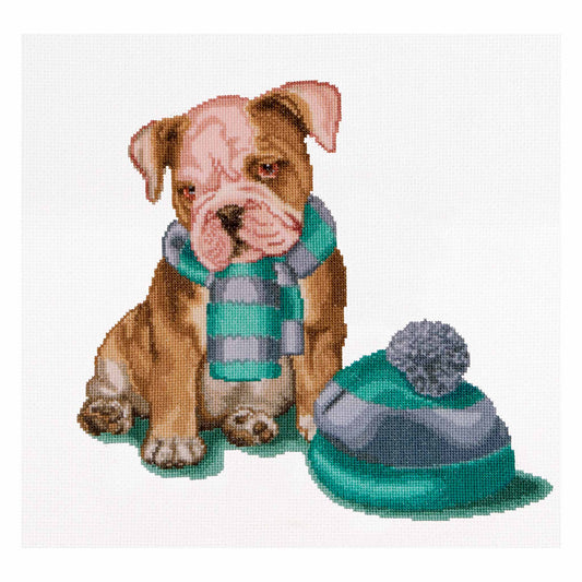 Cross-stitched design of a dog wearing a scarf and hat on a white background