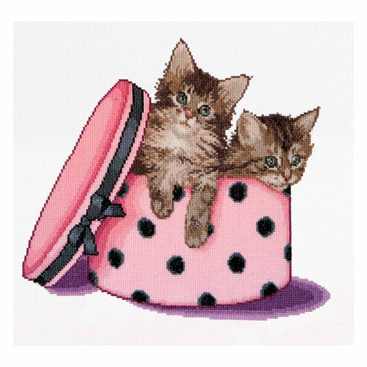 cross stitch pattern Two kittens inside a pink polka dot bag on a white background