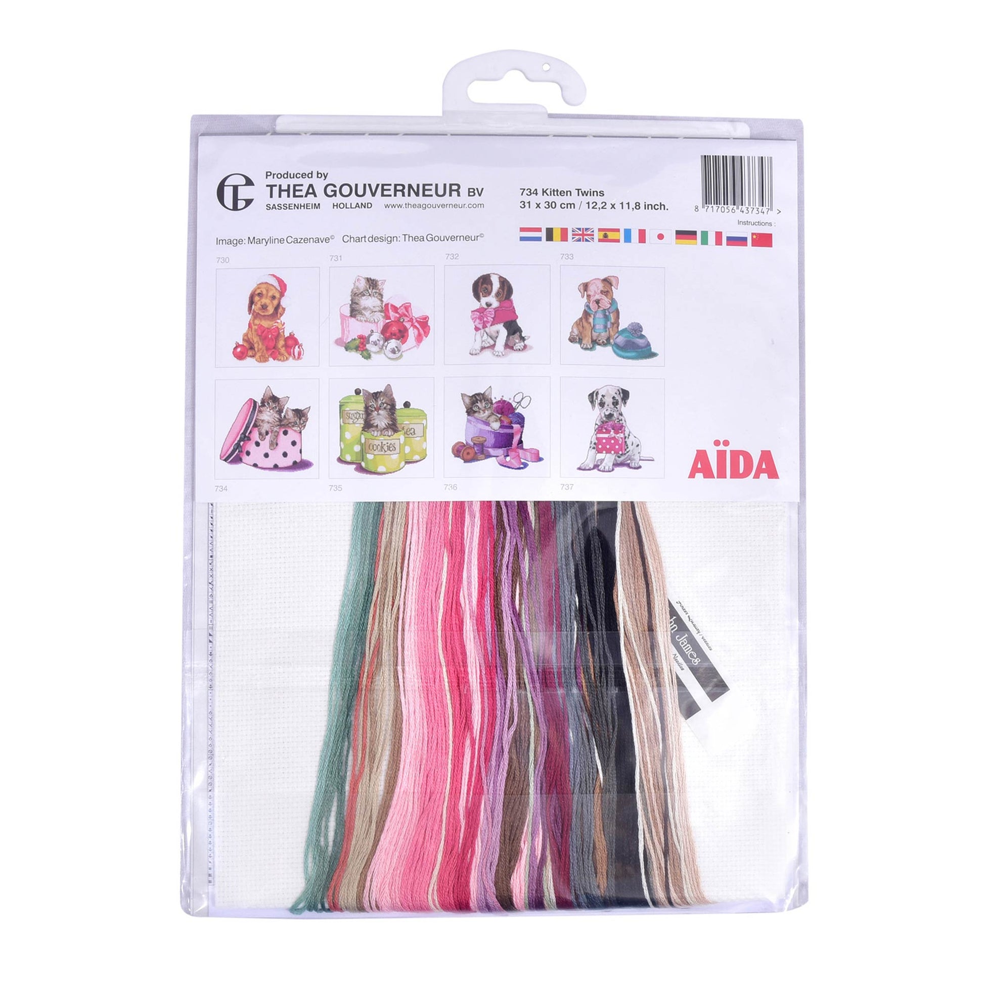 Package of Thea Gouverneur Aida fabric with colorful threads on a white background