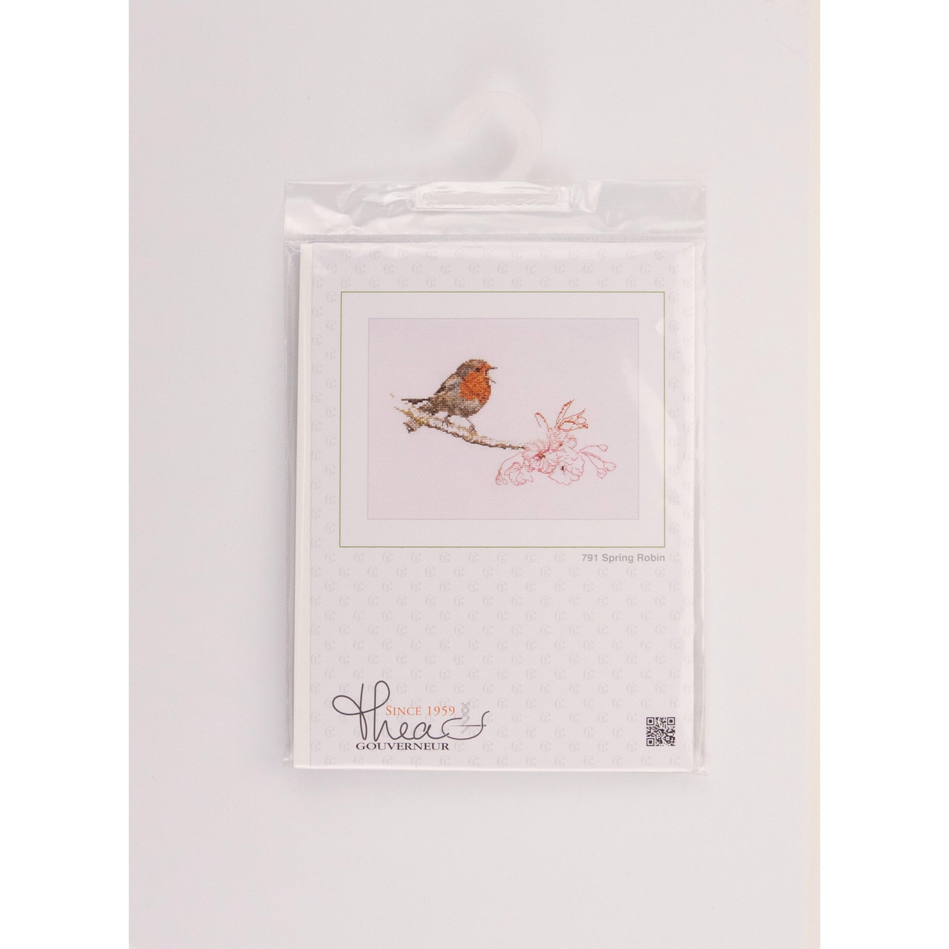Packaged cross stitch kit with a bird robin on the branch