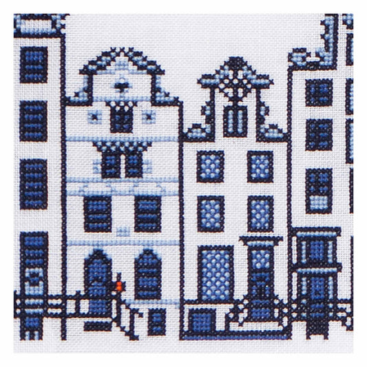 Cross stitch pattern of a canal scene with buildings in Amsrerdam.