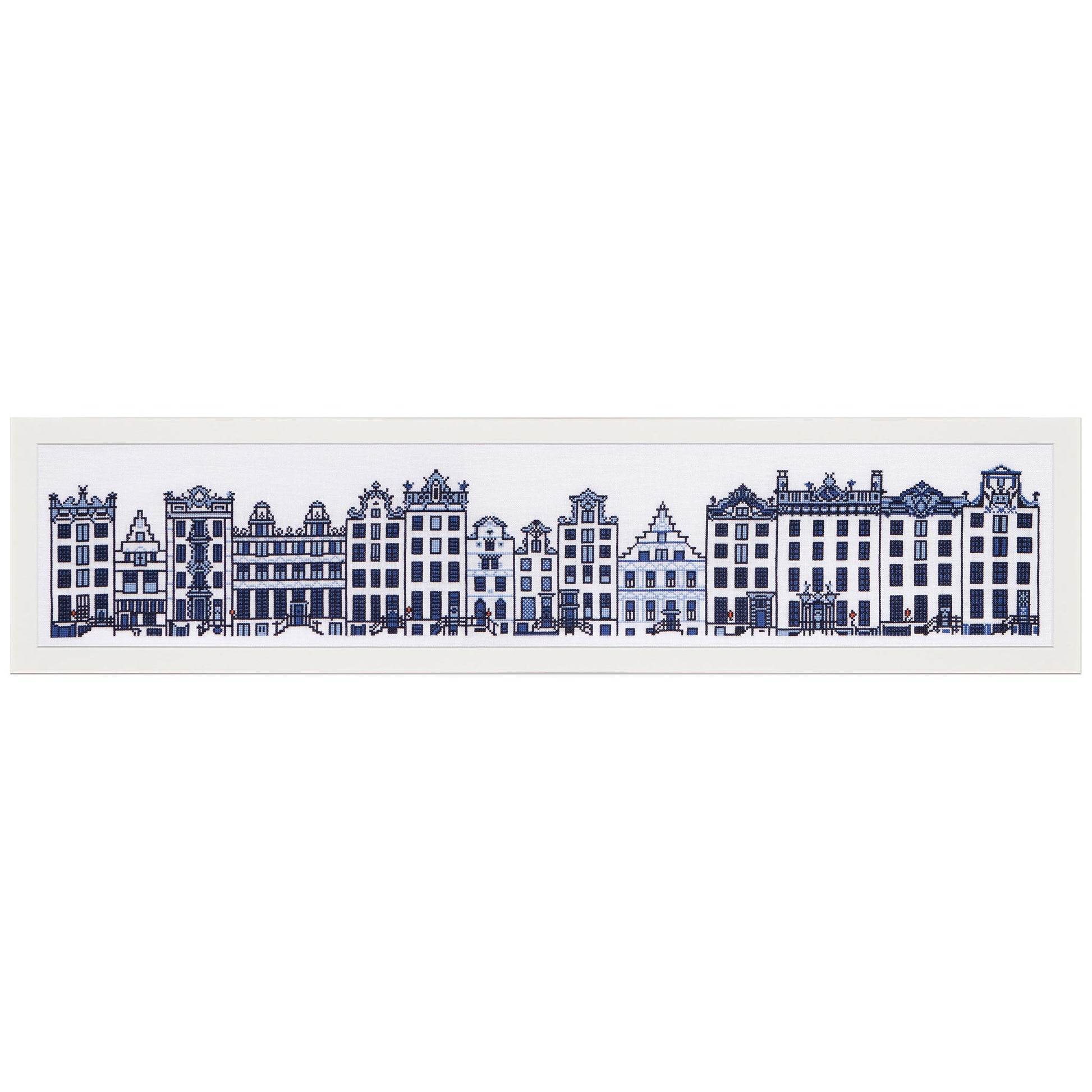 Cross stitch pattern of Dutch stylized buildings on a white background