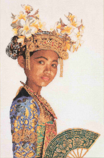 Traditional costume with intricate headpiece and fan cross stitch design