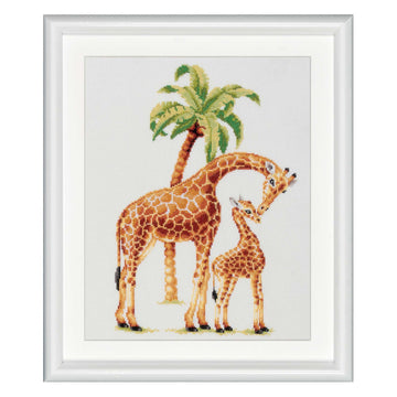 Framed cross-stitch pattern of two giraffes and a palm tree