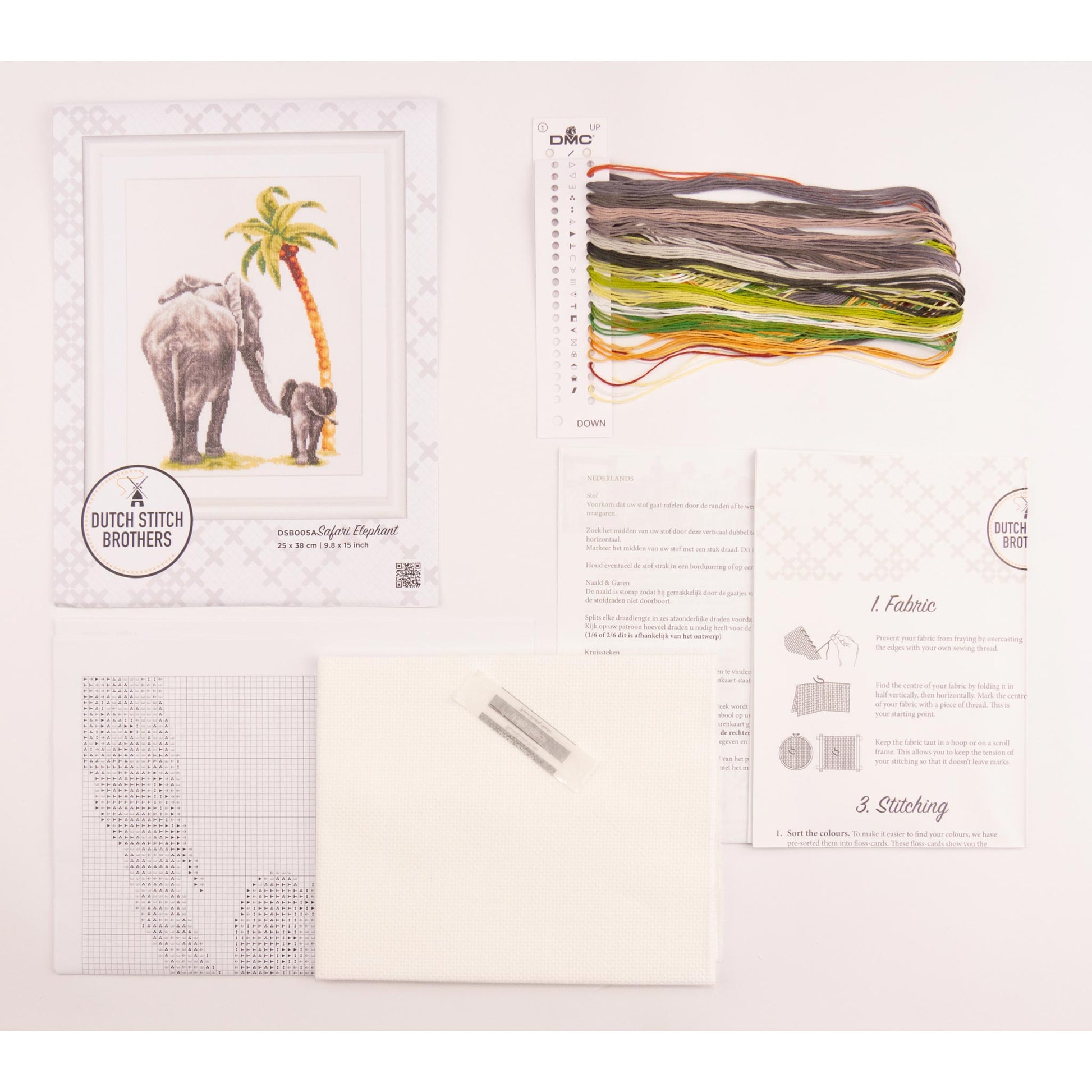 Embroidery kit with pattern and chart, needlework fabric, and threads on the floss organizer.