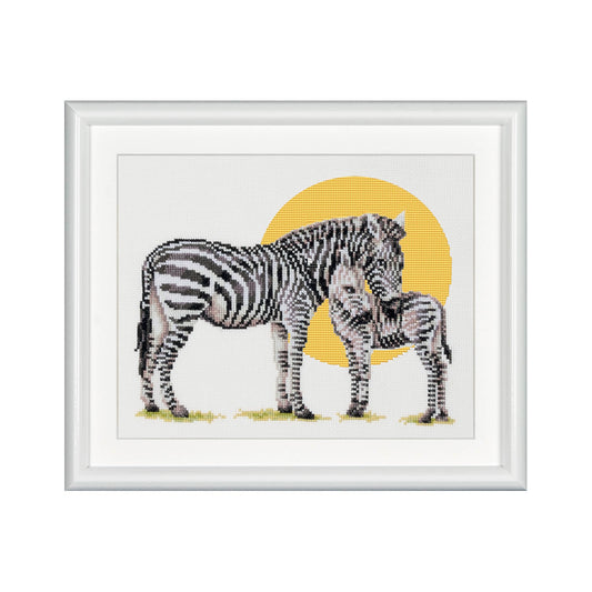 cross stitch design of two zebras with a yellow circle on a white background