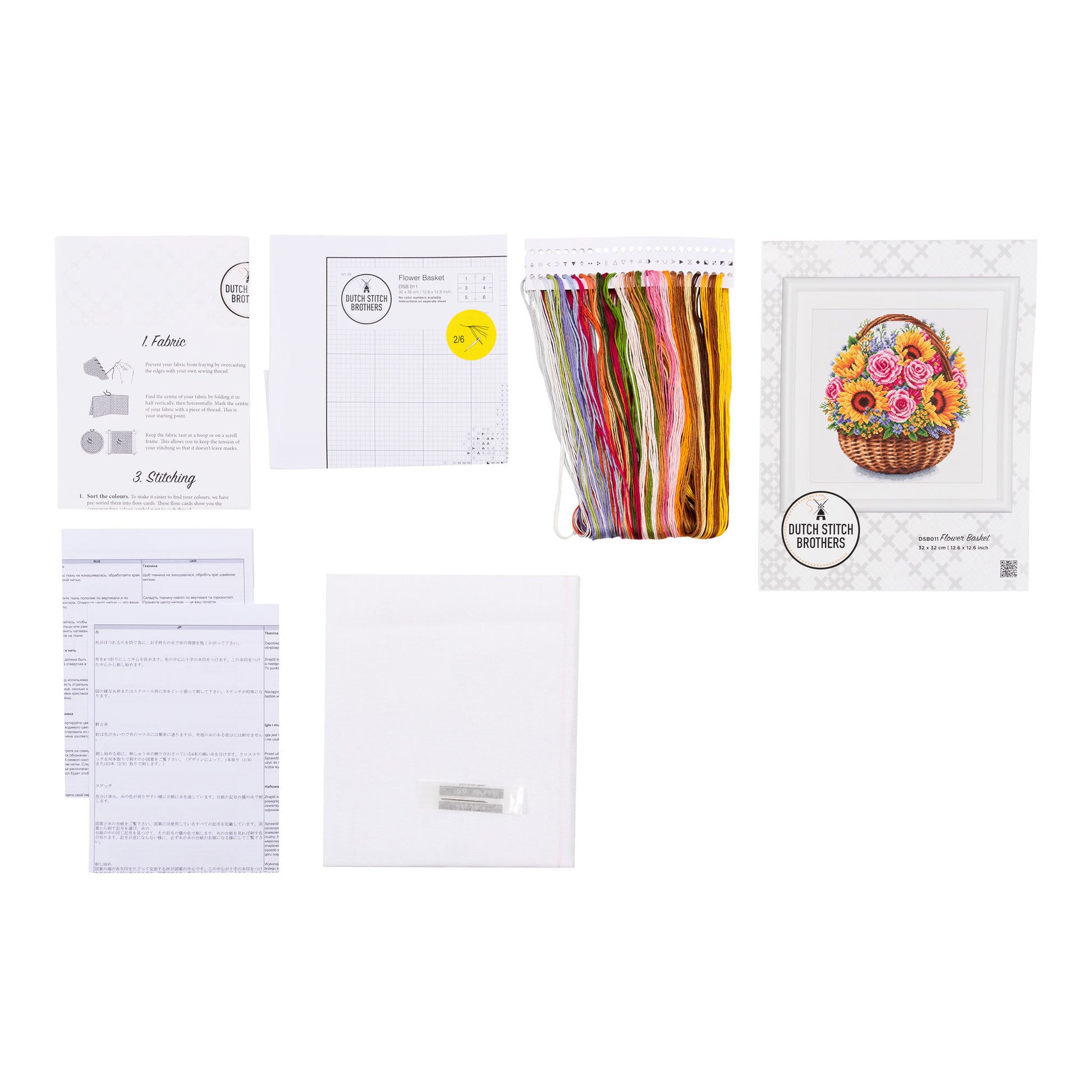 Embroidery kit with pattern and chart, needlework fabric, and threads on the floss organizer.